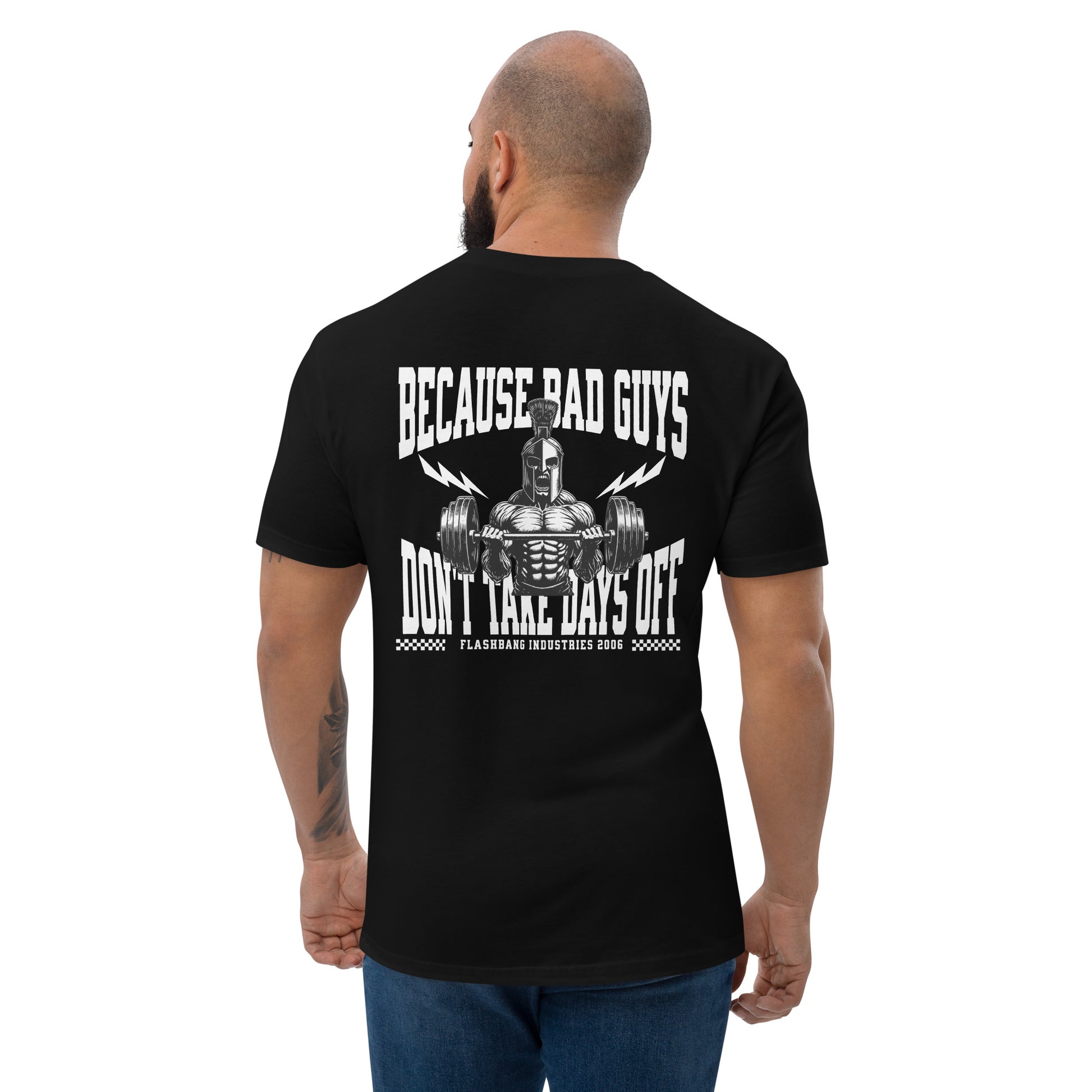 Bad Guys T-shirt with Spartan graphic, designed for powerlifters and gym enthusiasts. Features a workout motivation quote and bold style - Back View - Black - Model Guy