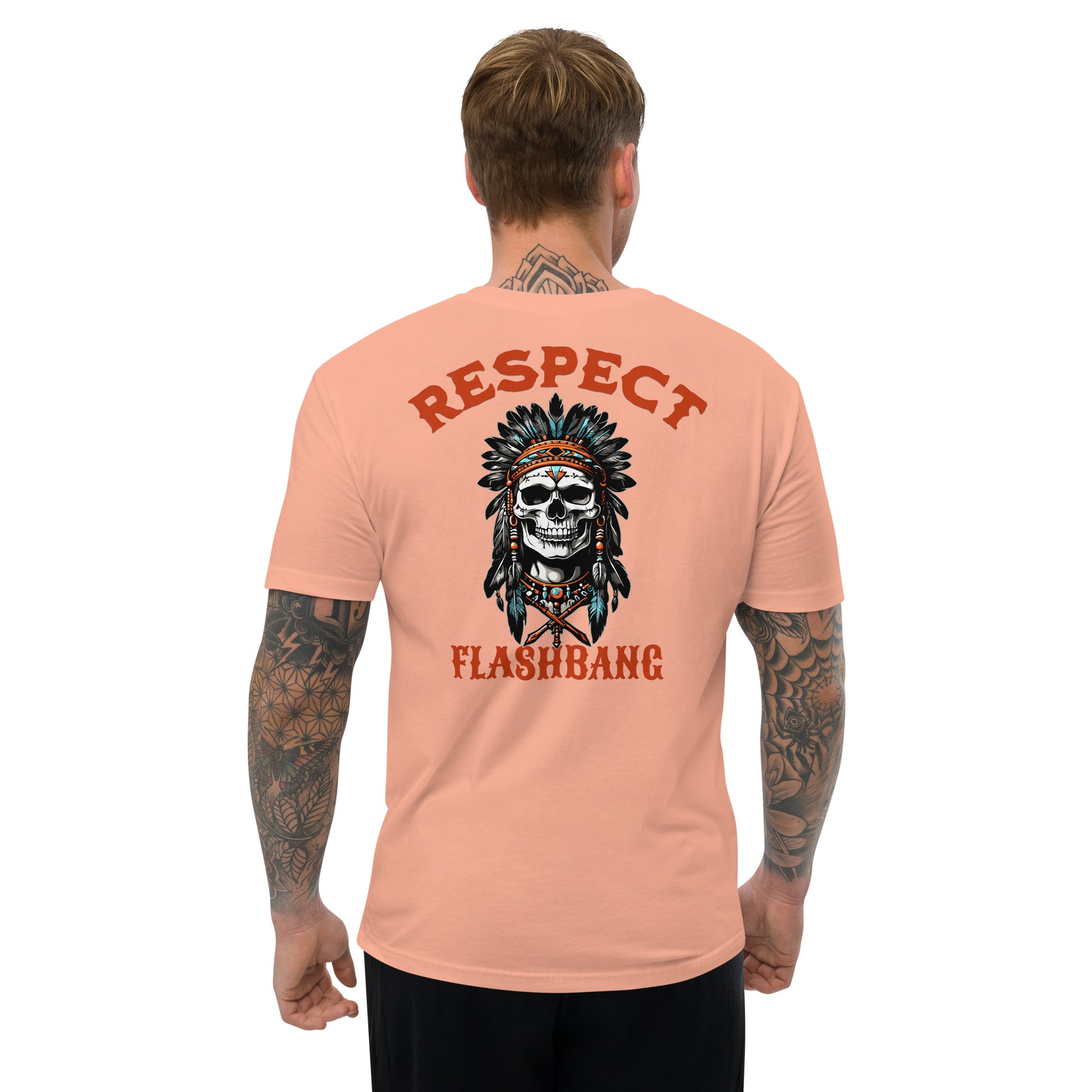 Man wearing a peach t-shirt with a skull and headdress design on the back, text 'RESPECT' and 'FLASHBANG'.