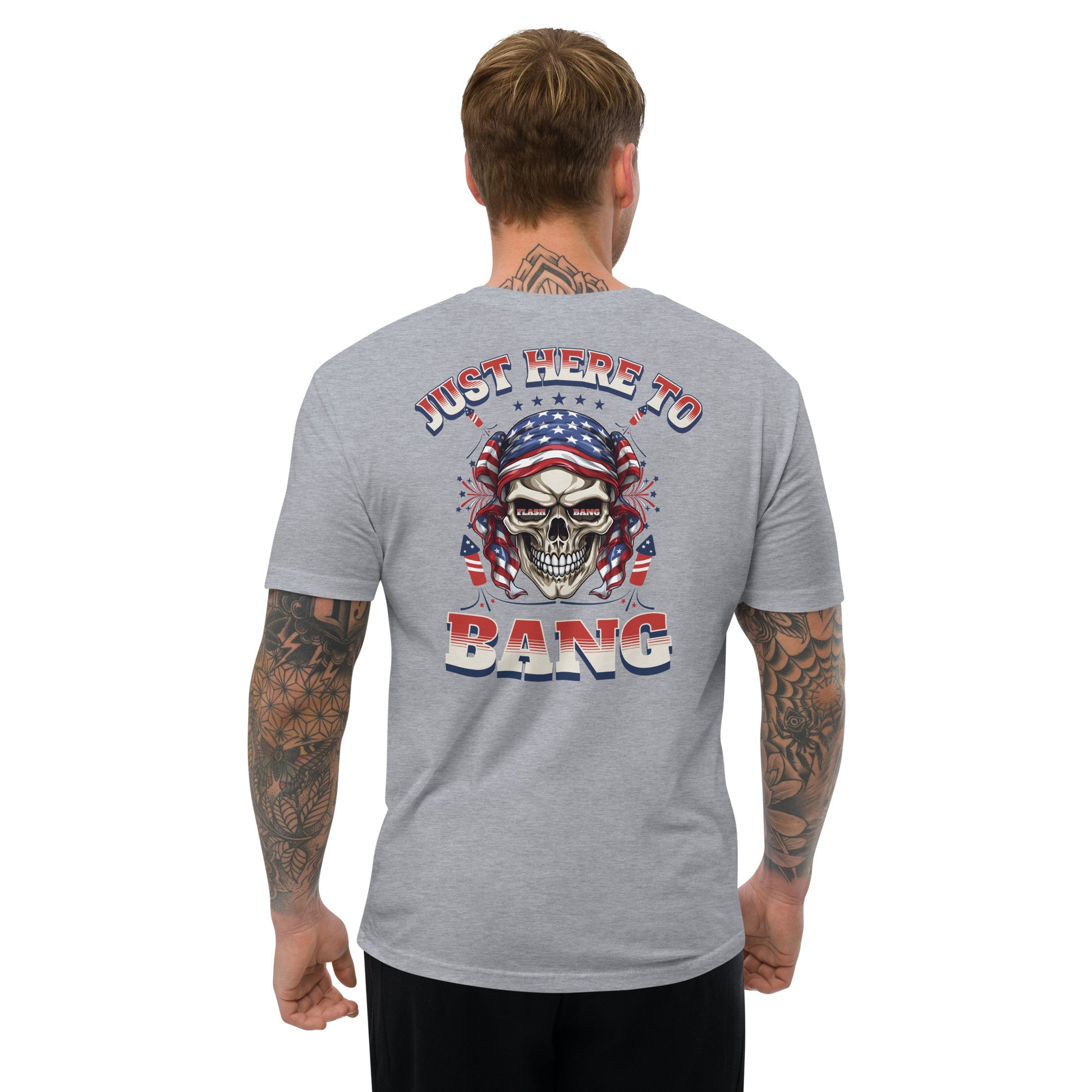 Gray t-shirt with a skull and American flag design on the back, worn by a person.