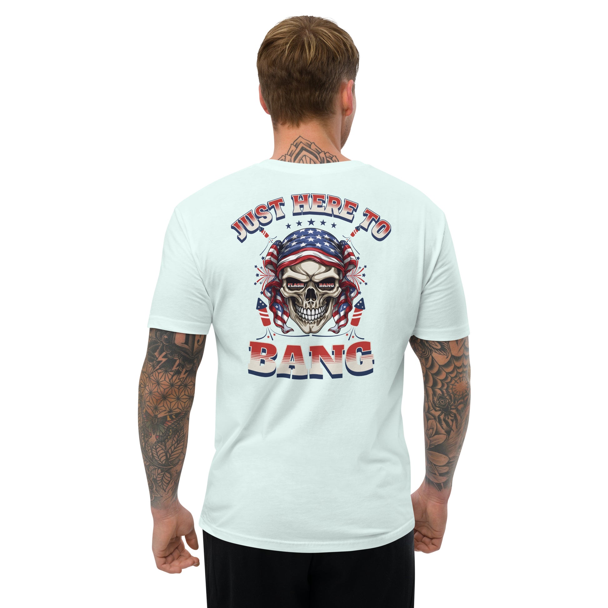 Man wearing a light blue t-shirt with a graphic design and text on the back, on a white background.