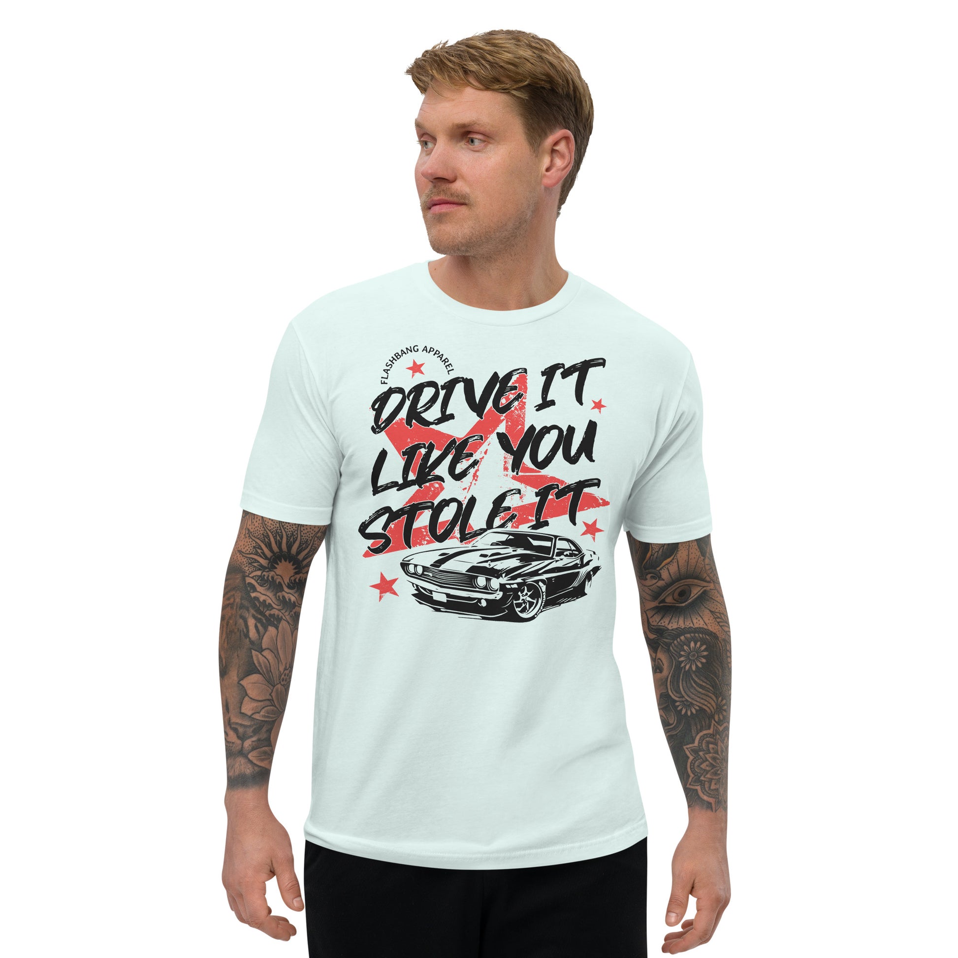 Man wearing a light blue t-shirt with a graphic design and text on a white background