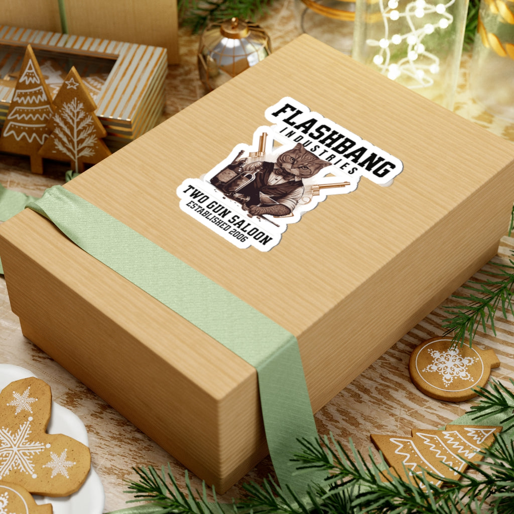 Wooden gift box with a 'Flashbang Whistlers' sticker on a festive background with cookies and greenery.