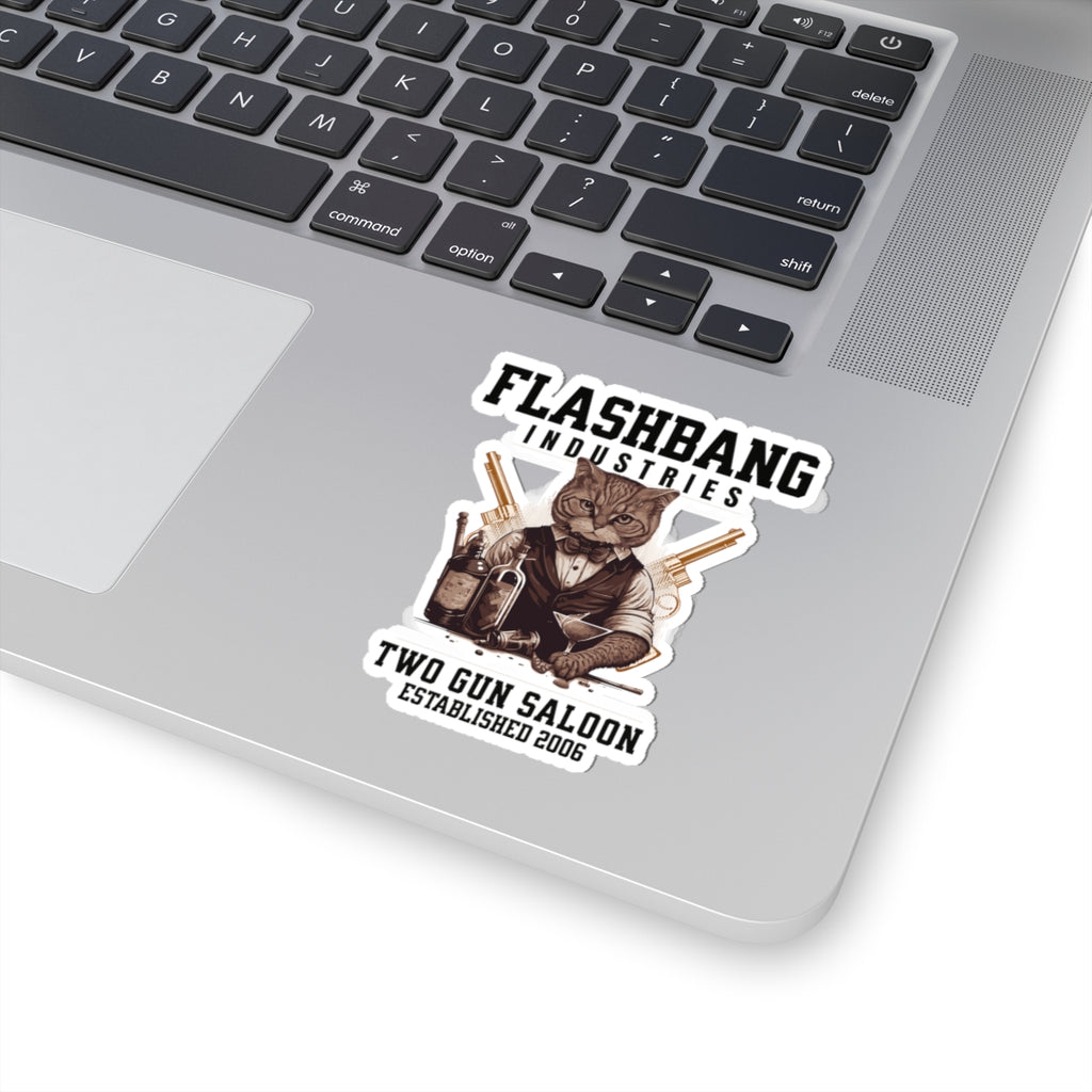Laptop with a 'Flashbang Industries' sticker featuring a cat holding guns.