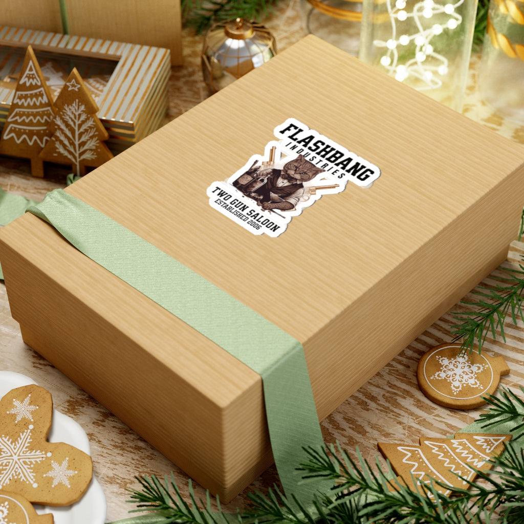 Wooden gift box with a green ribbon and 'Flashbang' sticker on a festive background with cookies and lights.