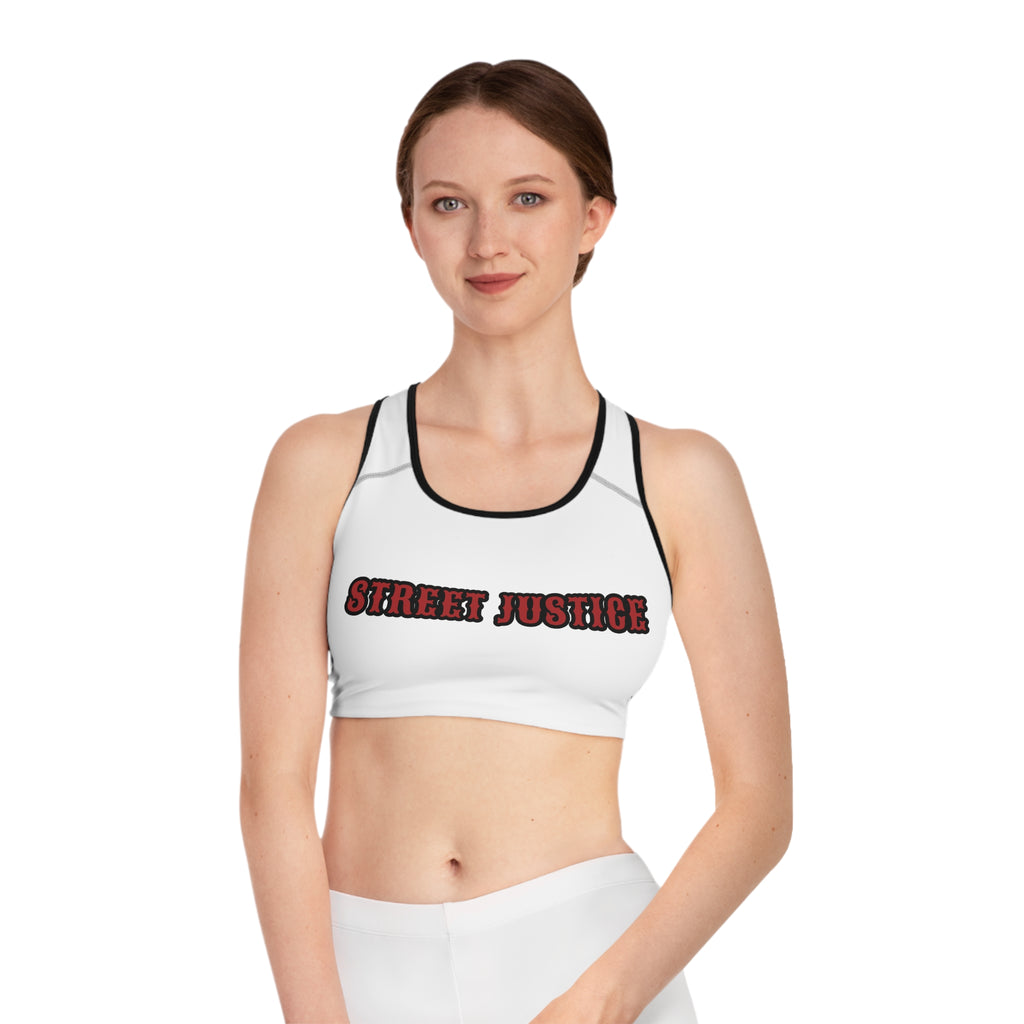 Street Justice sports bra featuring skull cowboy design with guns and skull graphic - Front View - White Stitching with Flashbang Text - Girl Model