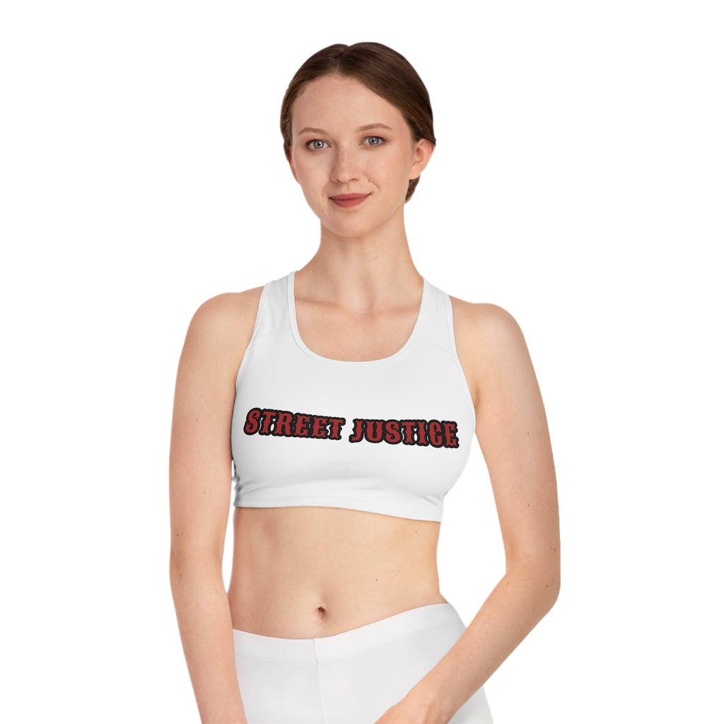 Street Justice sports bra featuring skull cowboy design with guns and skull graphic - Front View - White Stitching with Flashbang Text - Girl Model