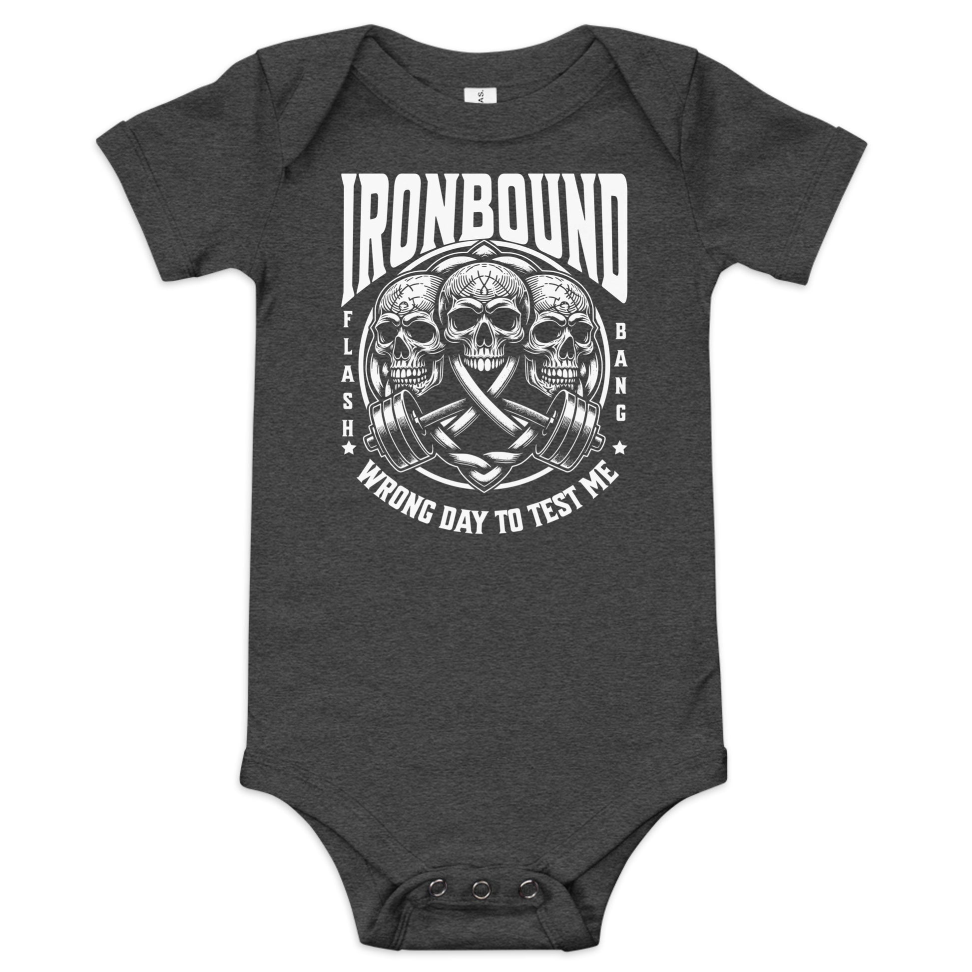 Dark gray baby onesie with skull and crossbar design and text on a white background