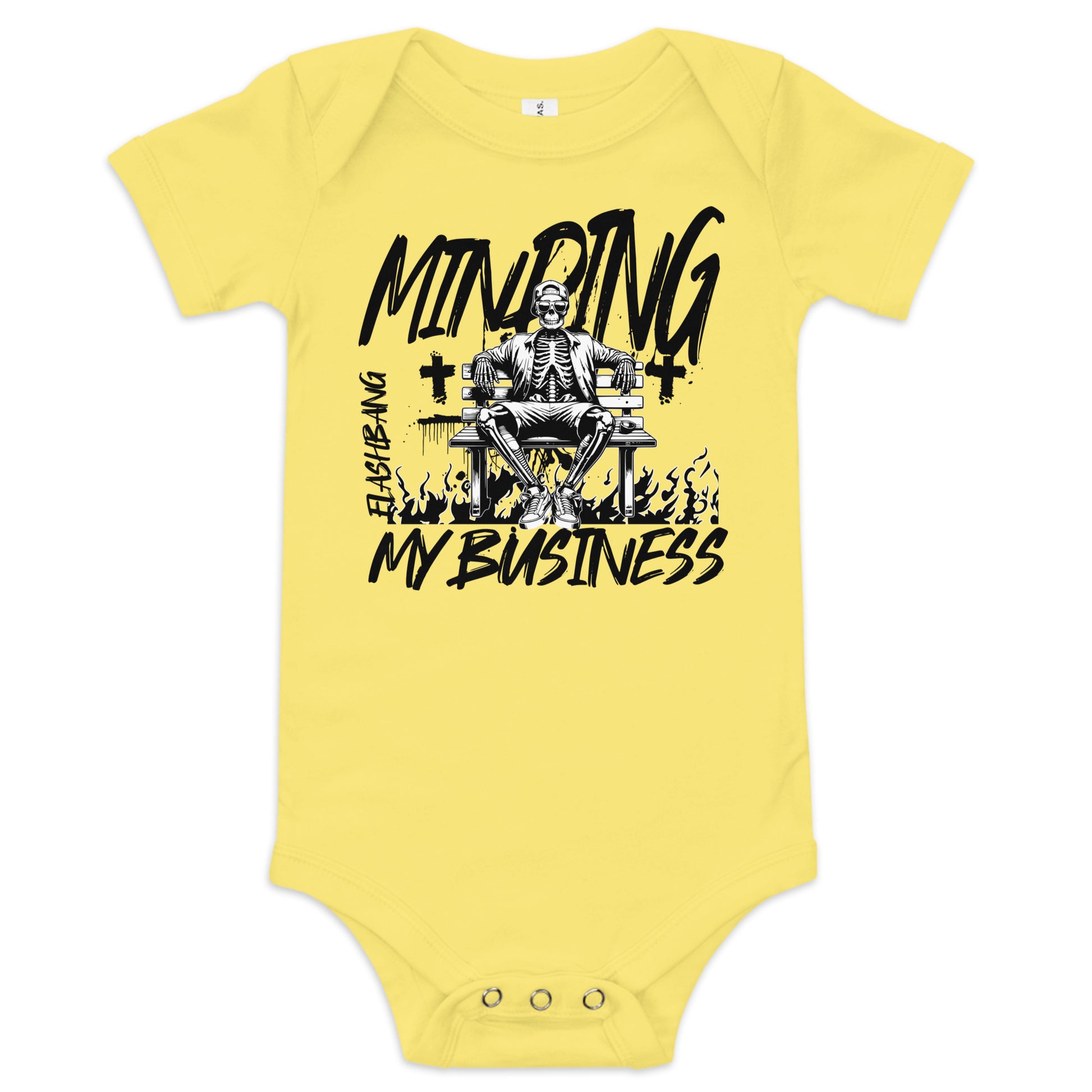 Yellow baby onesie with a skeleton on a chair graphic and text on a white background