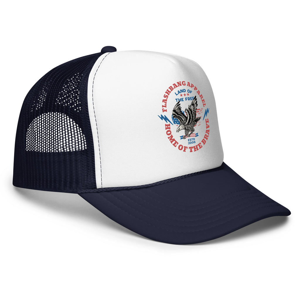 Navy and white trucker hat with an eagle design on a white background