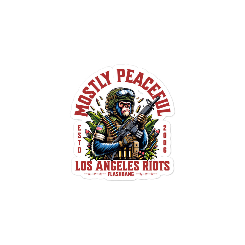 Sticker with a graphic of a monkey holding a gun and text 'Mostly Peaceful Los Angeles Riots Flashbang 2006' on a white background.