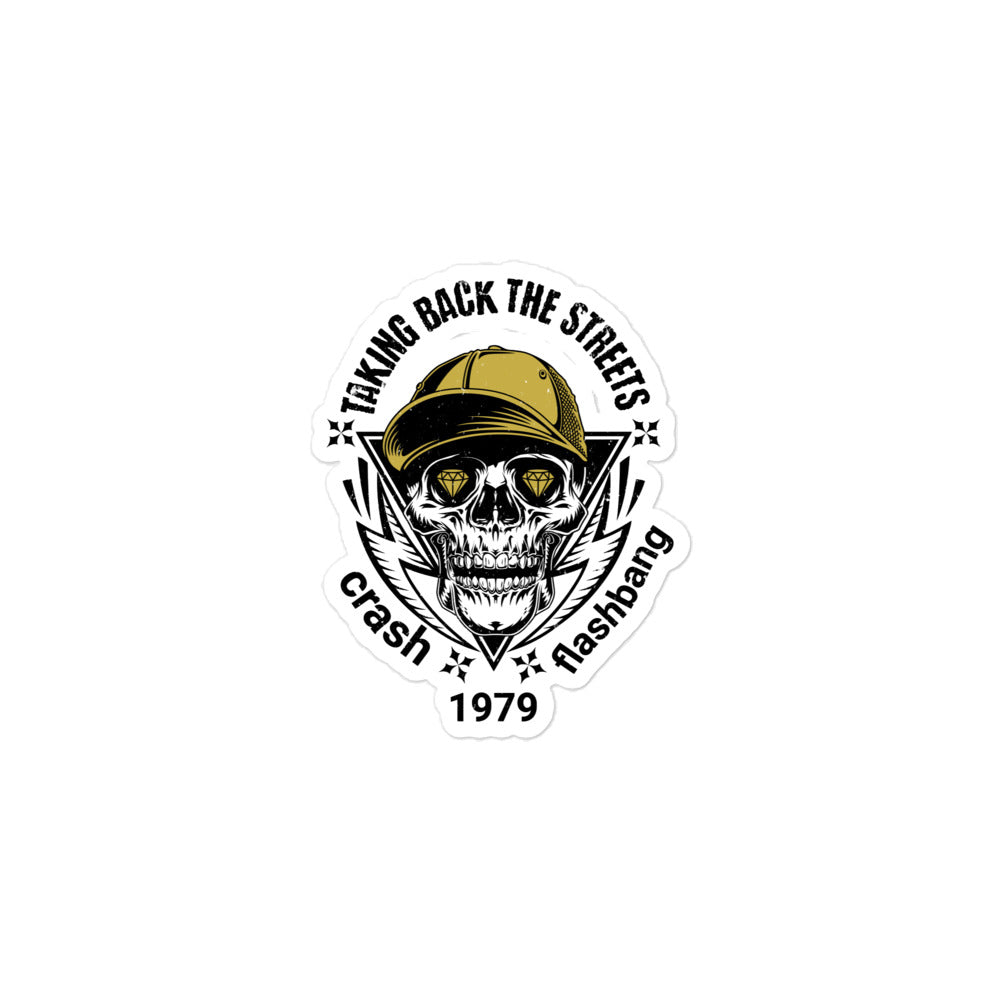 Sticker with skull wearing a cap and text 'Taking Back the Streets' on a white background