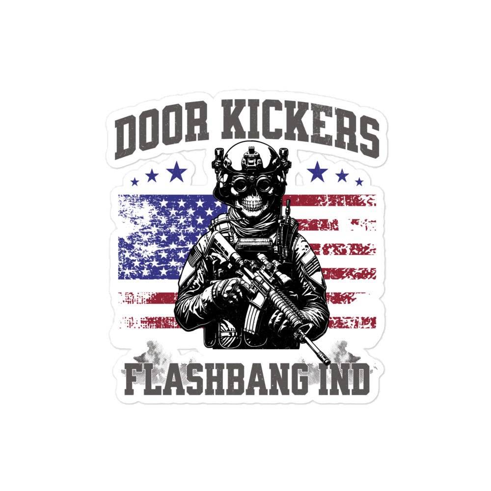 Sticker with a graphic of a person in a gas mask holding a rifle, American flag, and text 'Door Kickers Flashbang IND' on a white background.