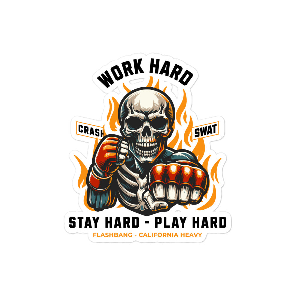 Skull with gloves and flames, text 'Work Hard', 'Stay Hard - Play Hard' on a white background