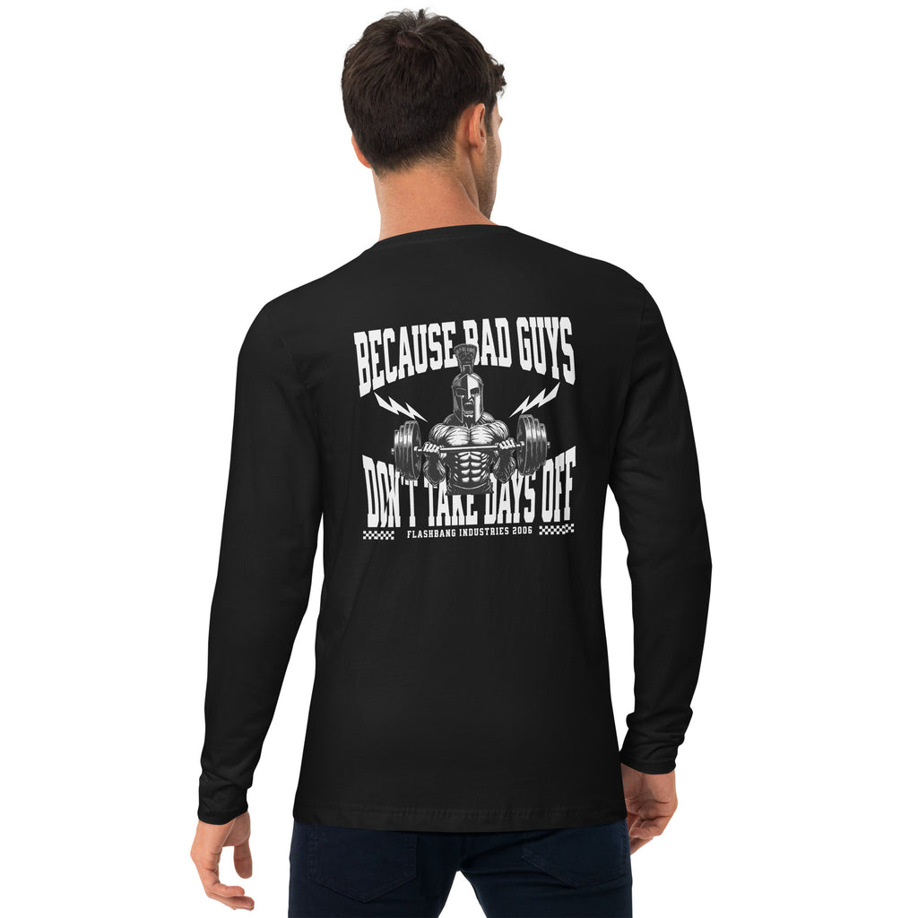 Black long-sleeve shirt with graphic design and text on the back, worn by a person.