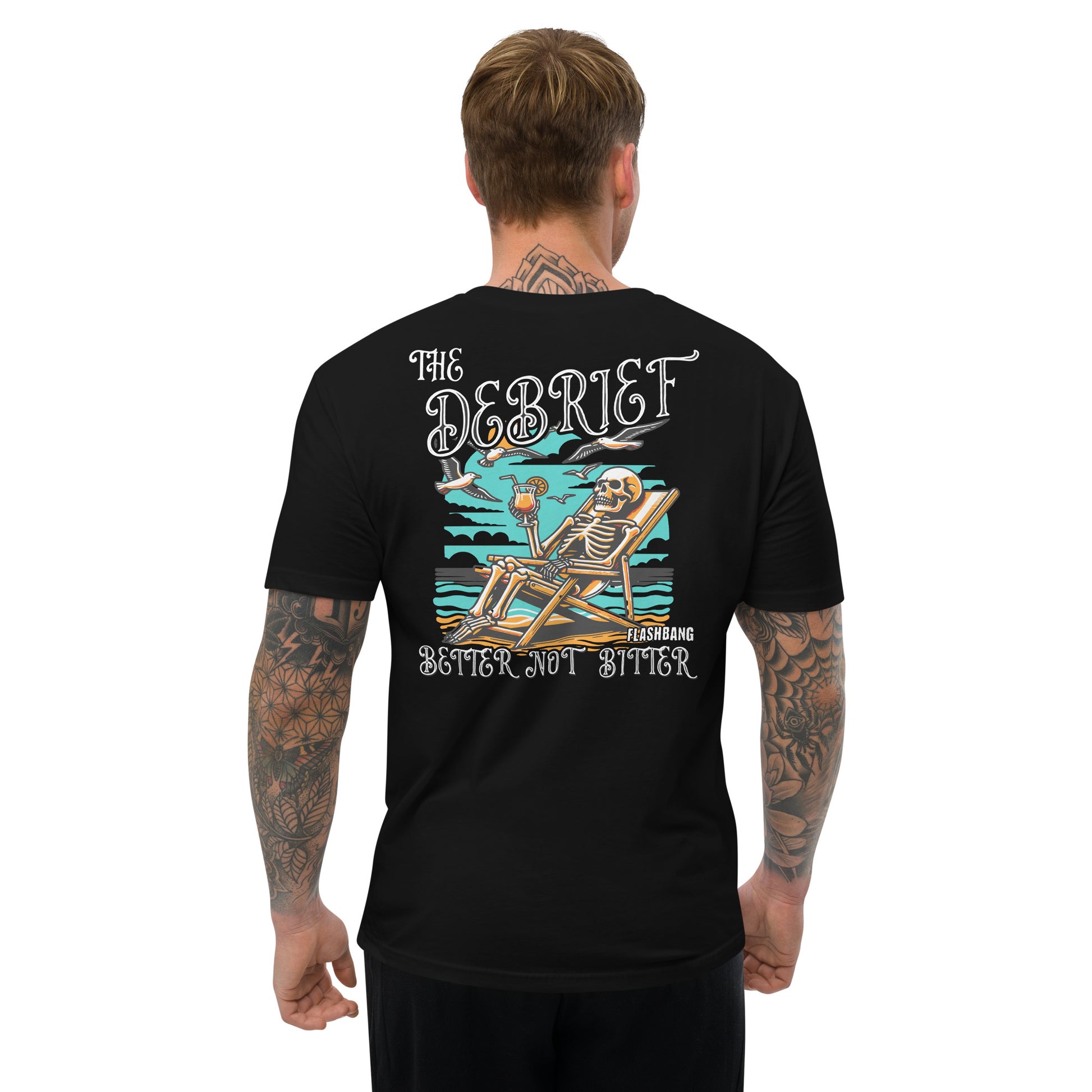 Person wearing a black t-shirt with a skeleton design and text on the back, on a white background.