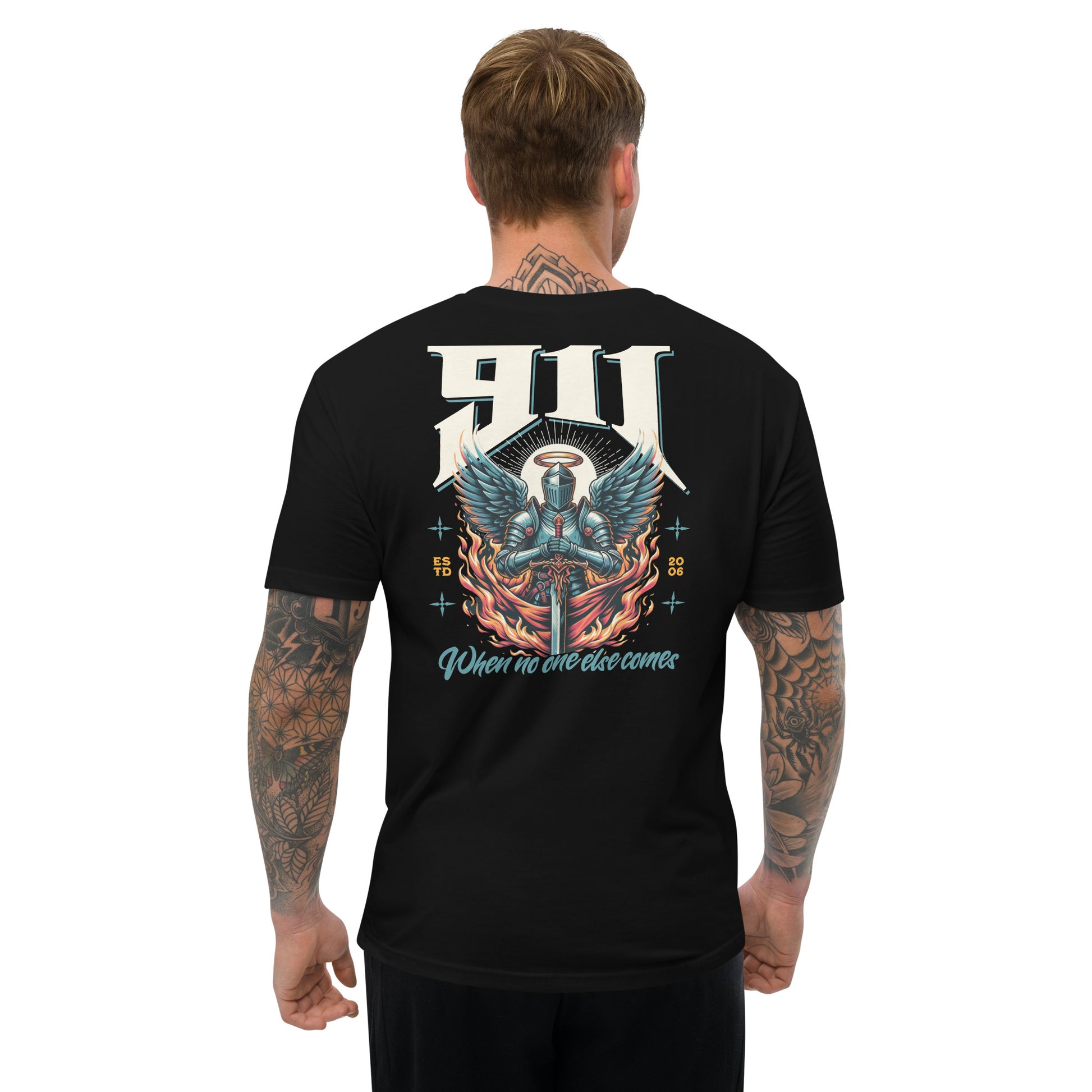 Man wearing a black t-shirt with a colorful graphic design on the back, featuring the number '911' and text.