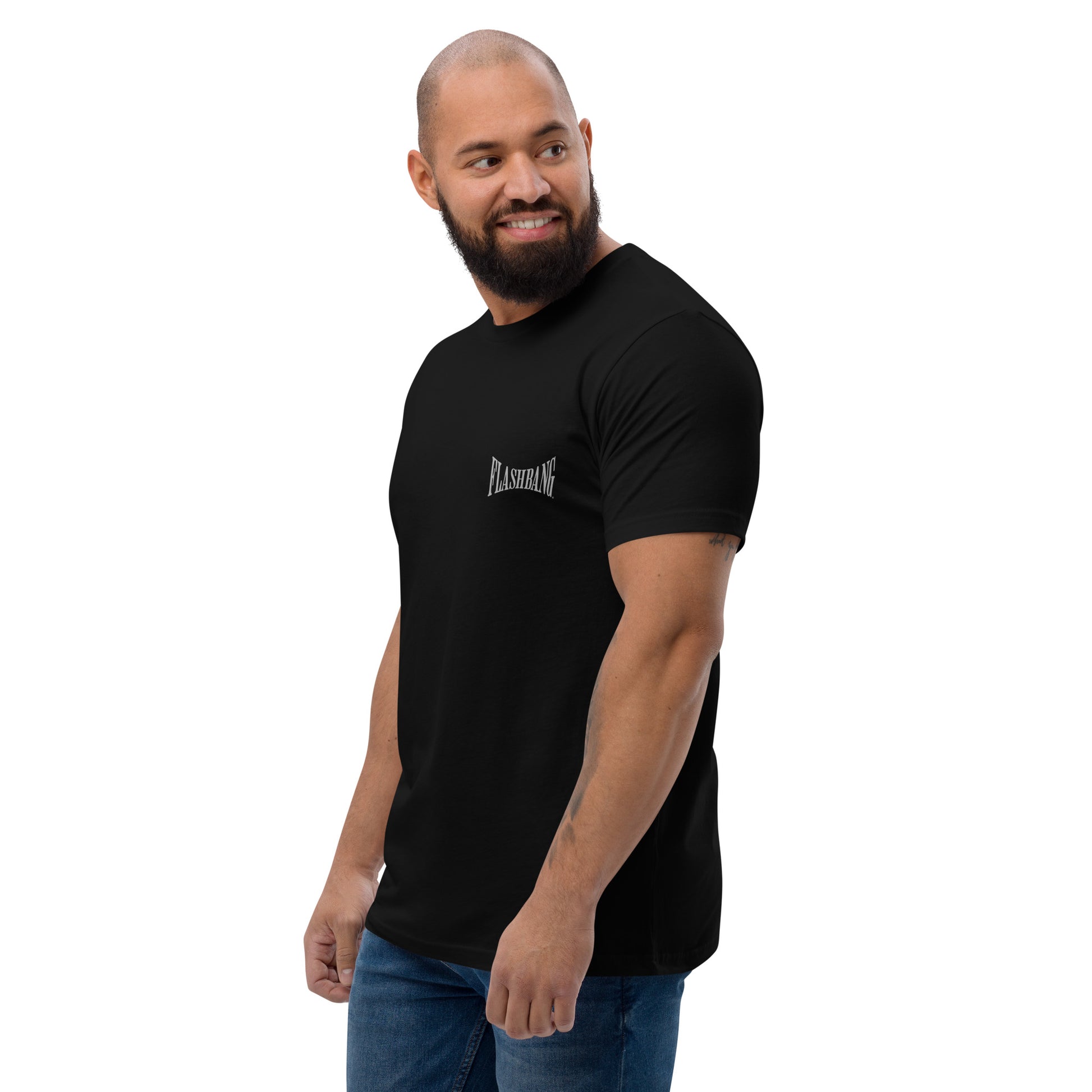 Bad Guys T-shirt with Spartan graphic, designed for powerlifters and gym enthusiasts. Features a workout motivation quote and bold style - Side View - Black - Model Guy