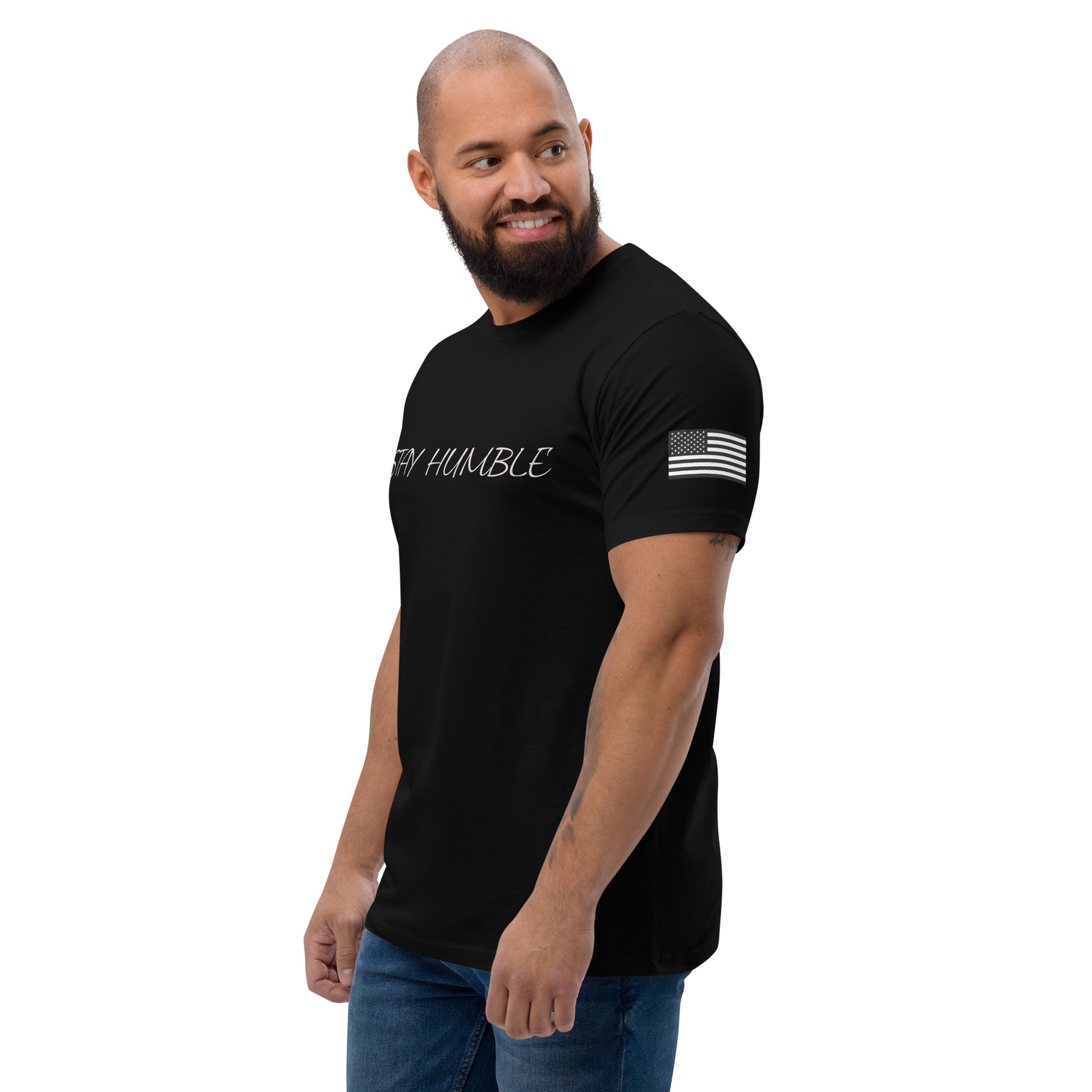 Stay Humble T-shirt with graphic design for men, featuring bold lettering - Side View - Black - Model guy