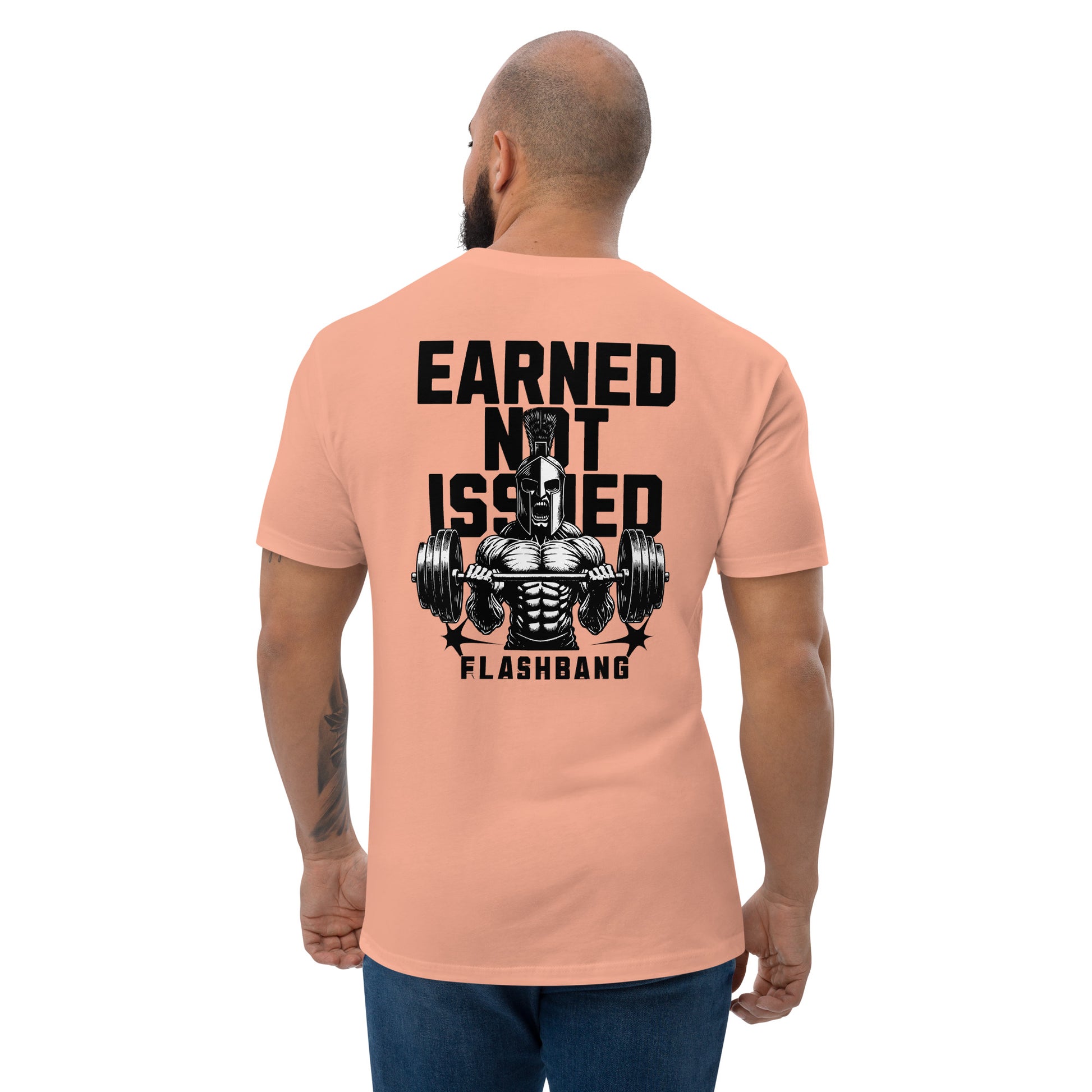 Earned Not Issued Lite T-shirt perfect for weightlifting and gym enthusiasts - Back View - Desert Pink - Model Guy