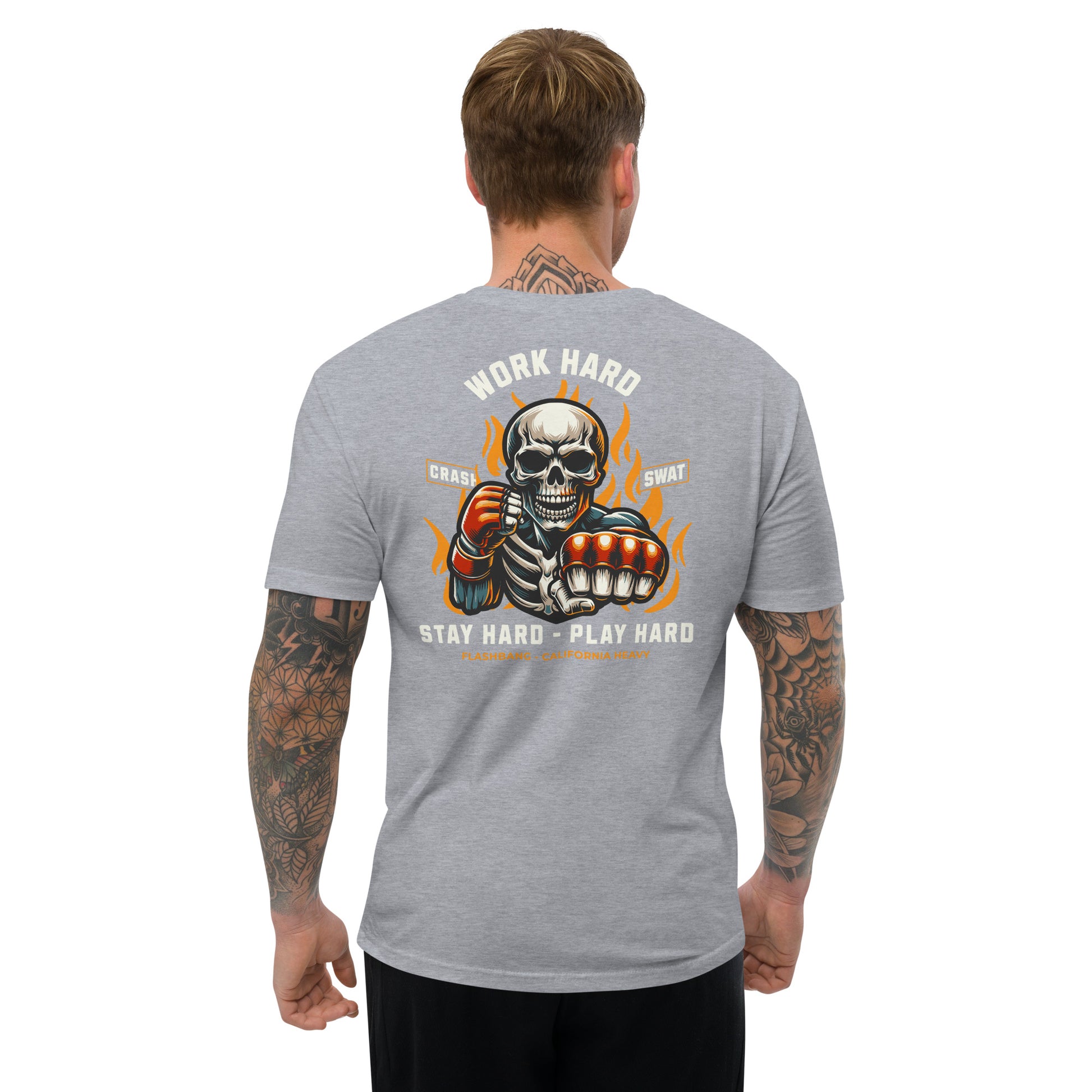 Gray t-shirt with a graphic design on the back featuring a skeleton and text, worn by a person.