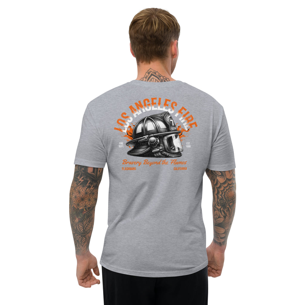 Man wearing a gray t-shirt with a graphic design on the back, featuring text and a helmet.