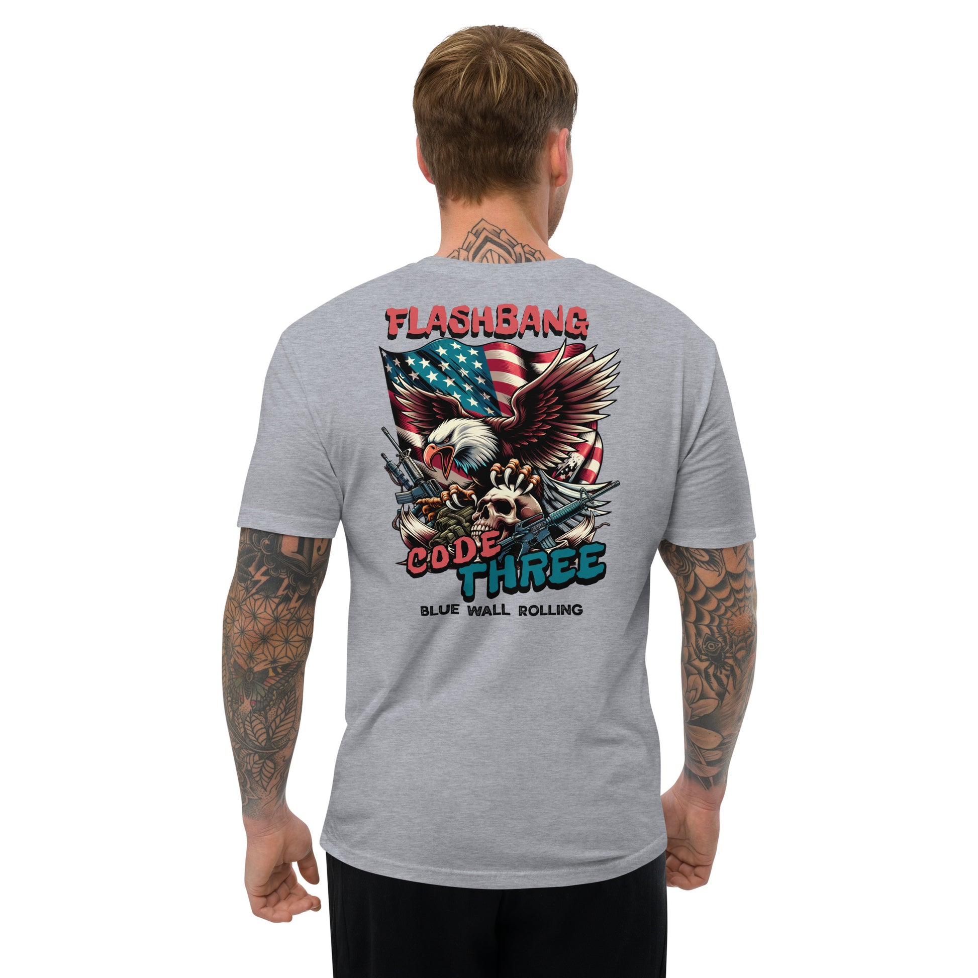 Gray t-shirt with 'Flashbang Code Three' design on the back, worn by a person.