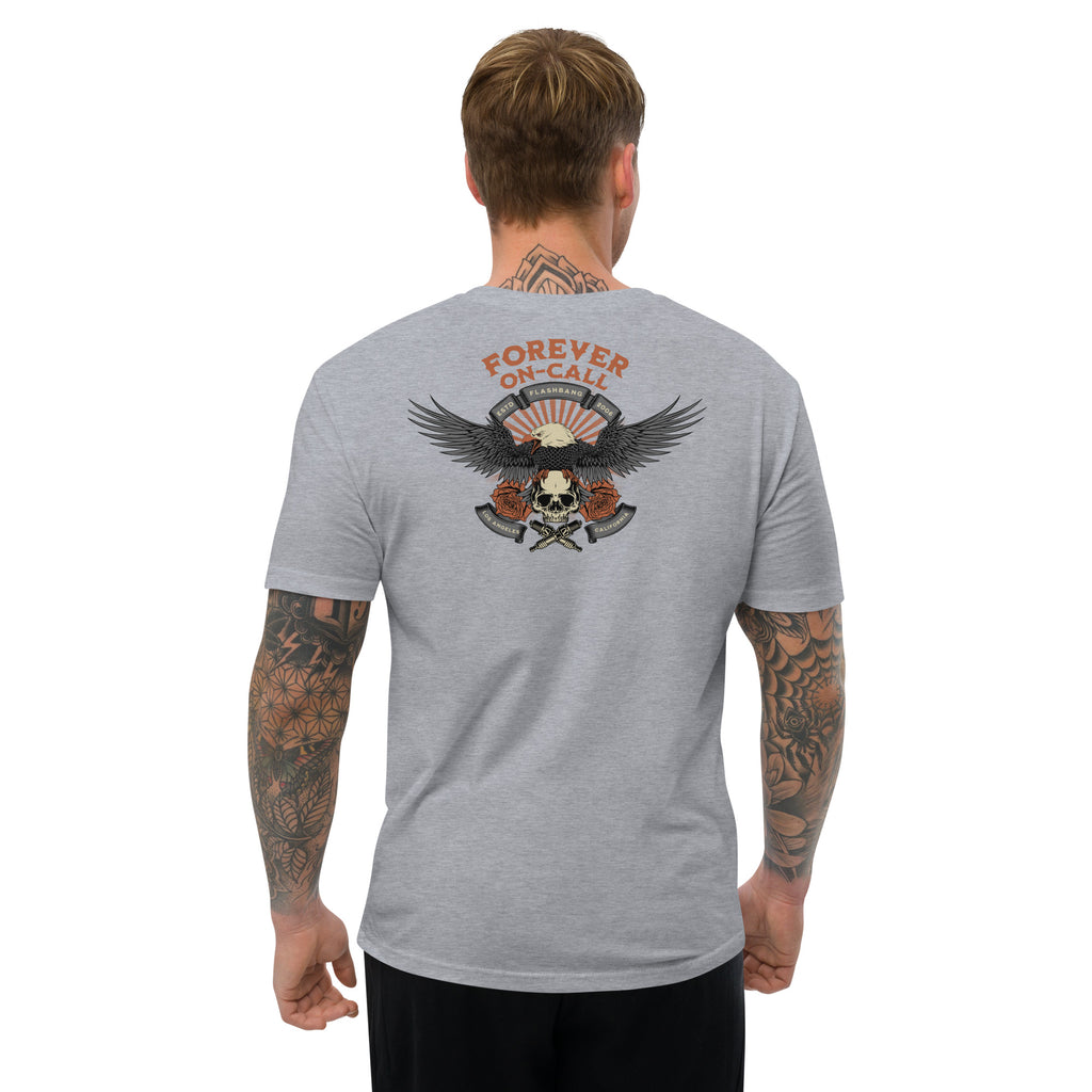 Man wearing a gray t-shirt with a graphic design on the back, featuring text and an eagle.