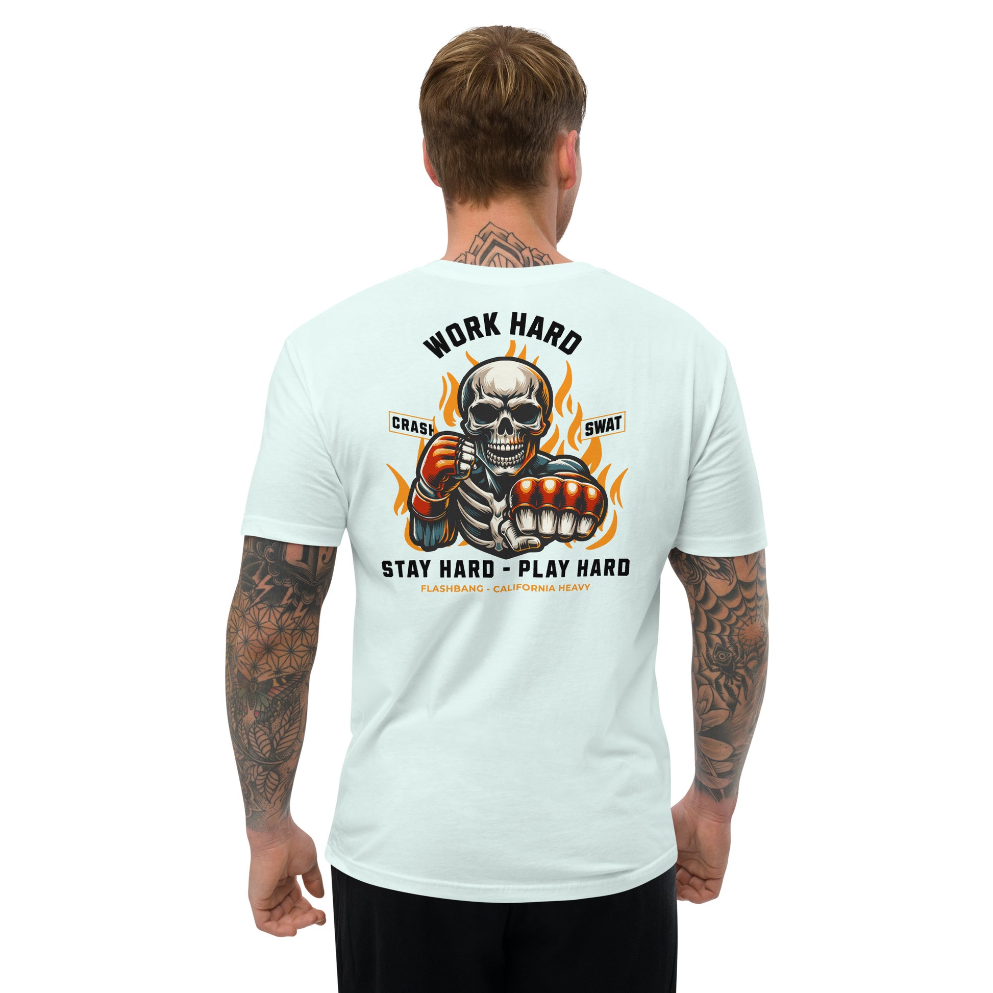 Man wearing a light blue t-shirt with a graphic design and text on the back, on a white background.