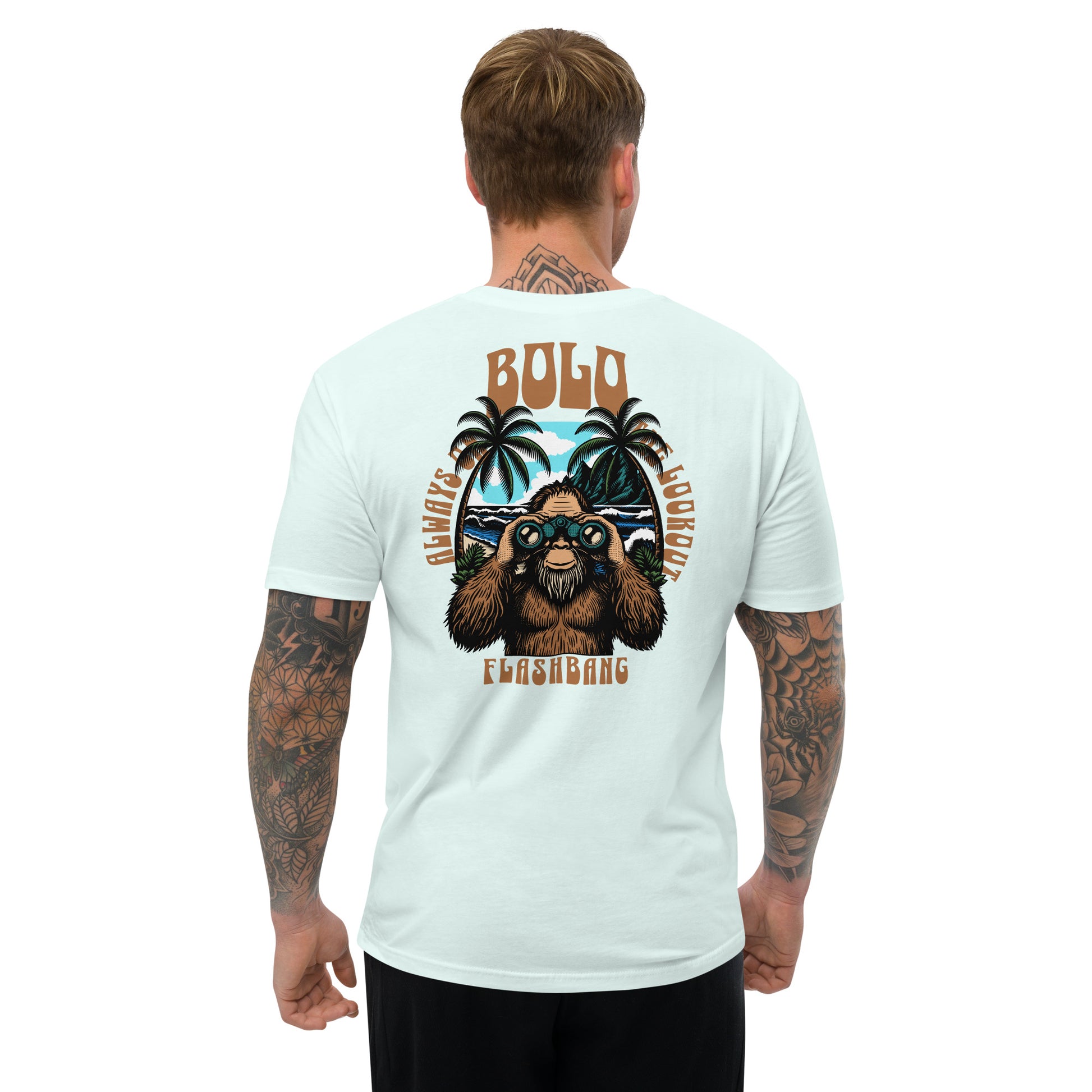 Man wearing a light blue t-shirt with a graphic design on the back, featuring a bear and palm trees.