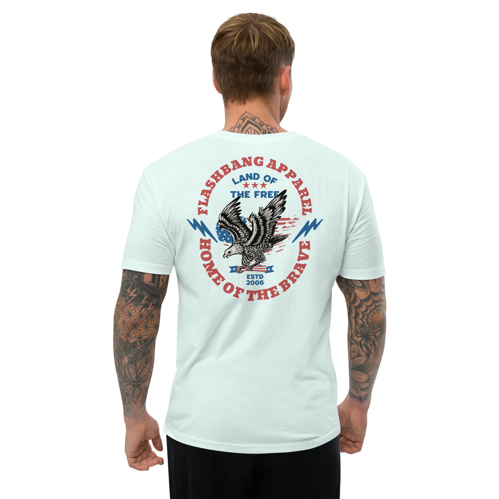 Man wearing a light blue t-shirt with a graphic design on the back, featuring an eagle and text.