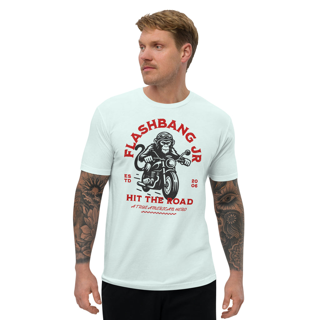 Man wearing a light blue t-shirt with 'Flashbang Jr' graphic design on a white background