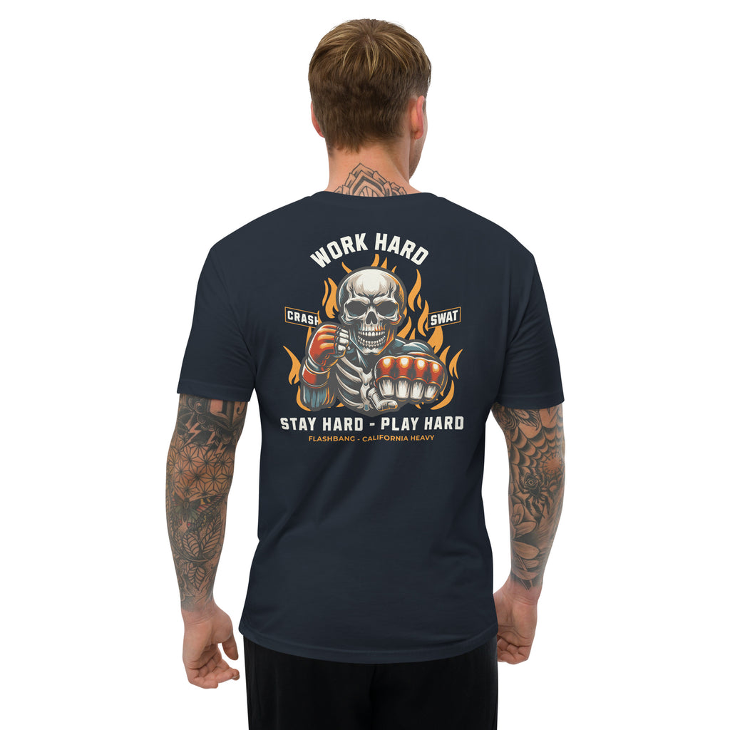 Man wearing a black t-shirt with a graphic design on the back, featuring text and a skull.
