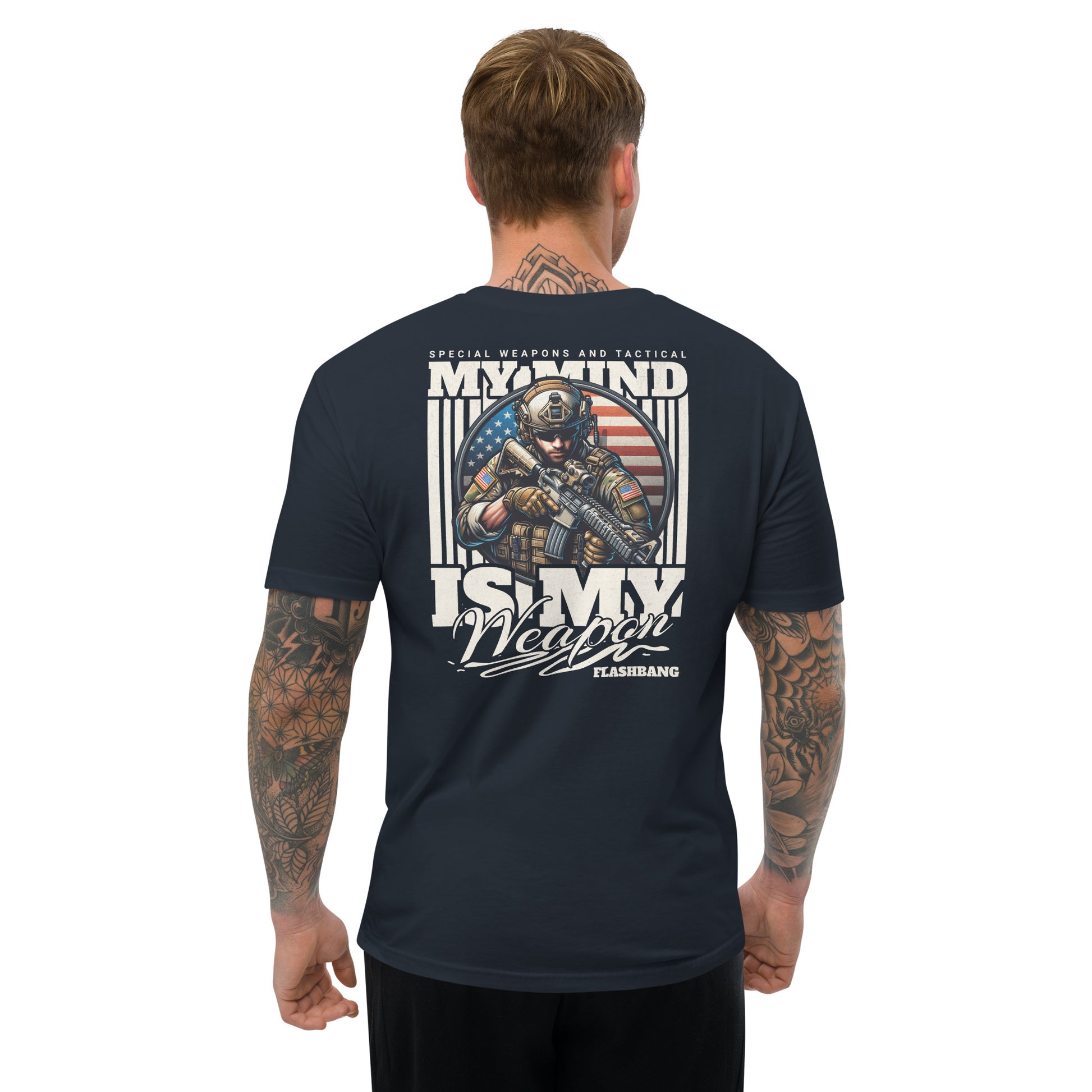 Man wearing a black t-shirt with a graphic design on the back, featuring text and an American flag.