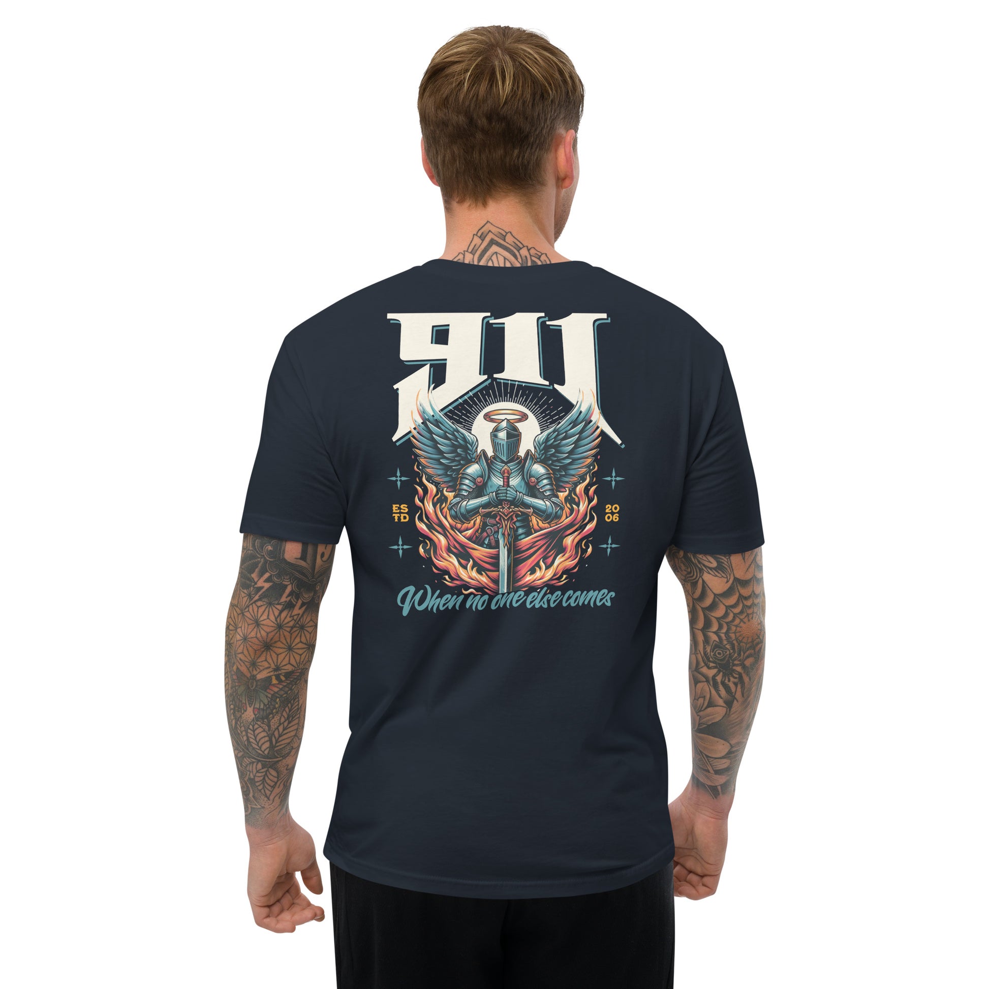 Man wearing a black t-shirt with a colorful graphic design on the back, standing against a white background.