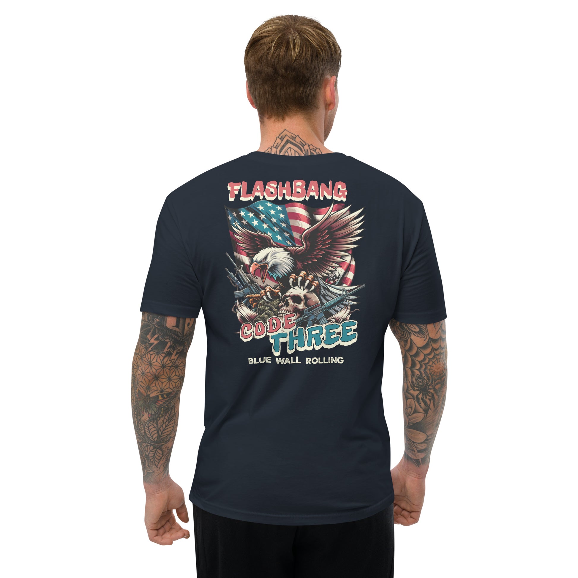 Man wearing a black t-shirt with a graphic design on the back, featuring an eagle and text.