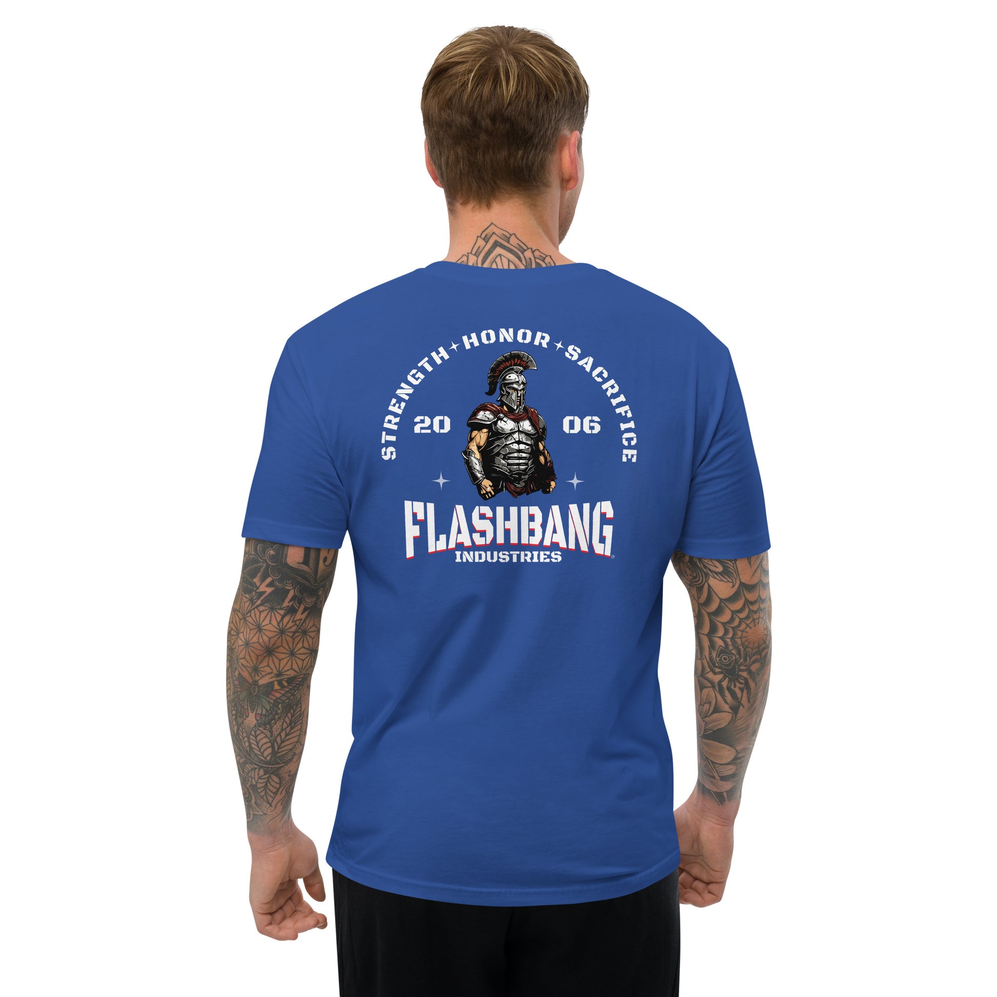 Man wearing a blue t-shirt with 'Flashbang Industries' logo and text on the back