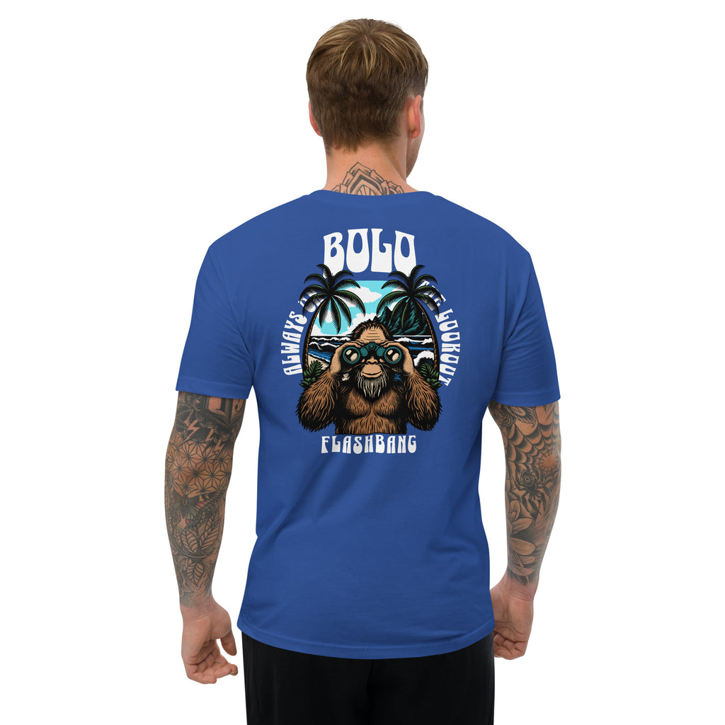 Man wearing a blue t-shirt with a graphic design on the back, featuring text and a bear-like character.