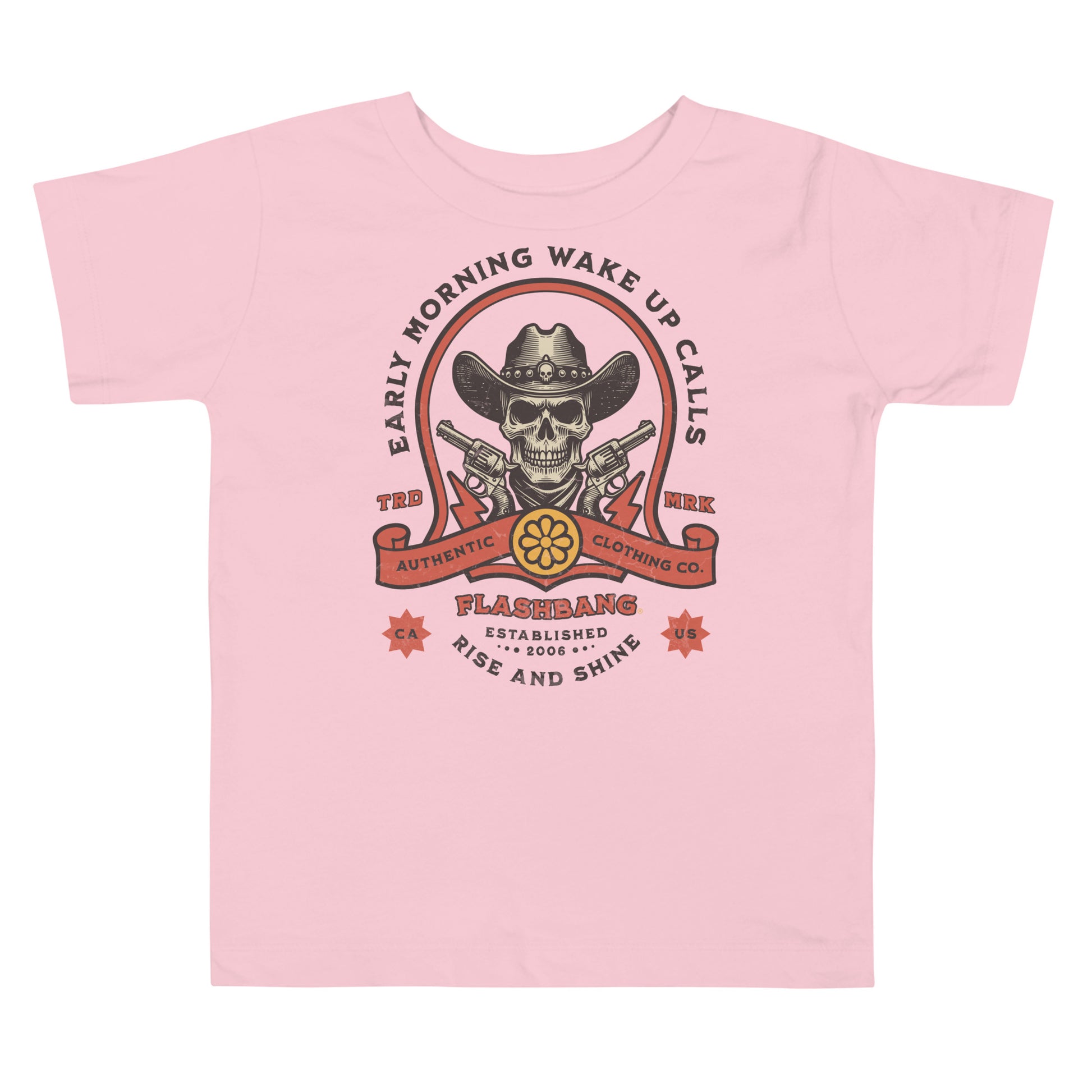 Pink t-shirt with a graphic design featuring a cowboy hat, skull, and text on a white background.