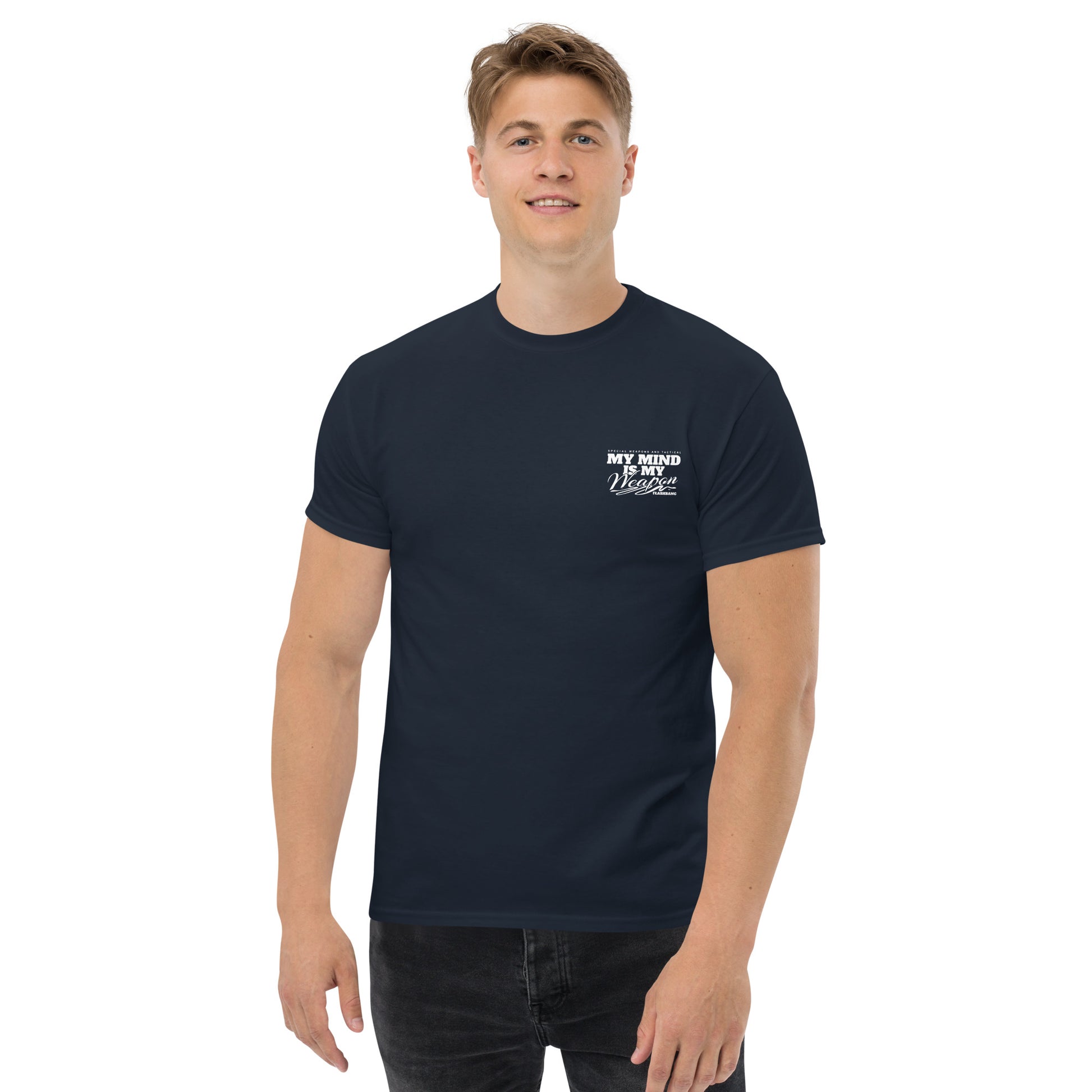 Man wearing a navy blue t-shirt with a logo on a white background