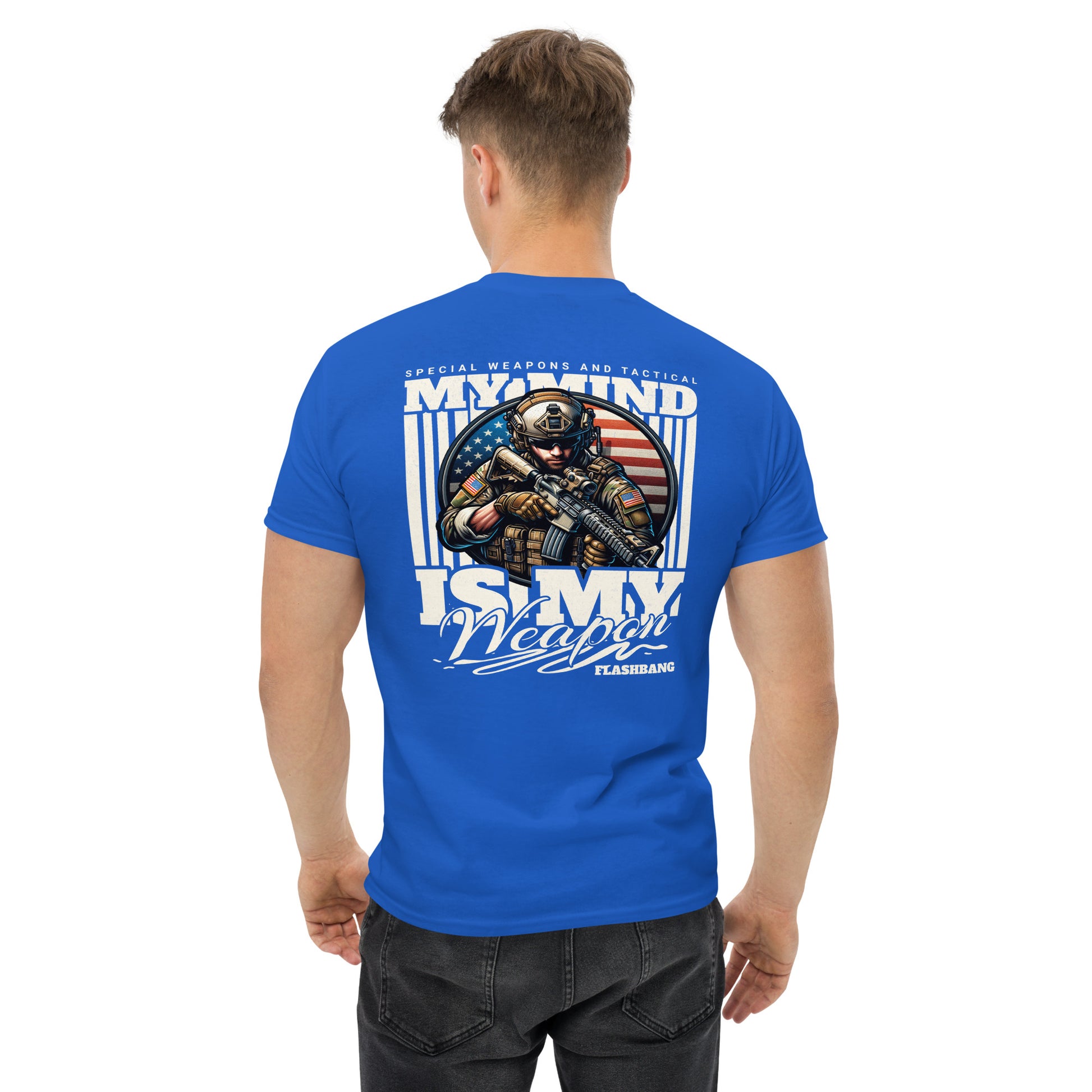 Man wearing a blue t-shirt with a graphic design on the back, featuring text and an American flag.