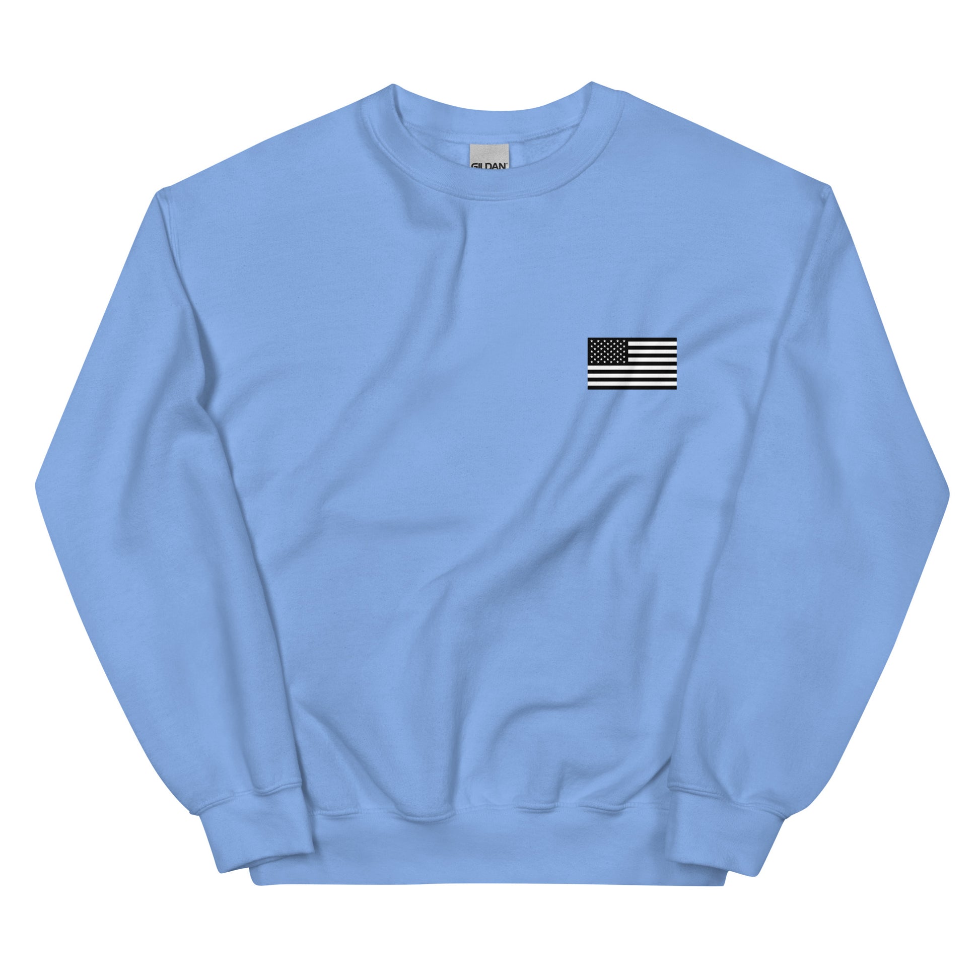Light blue sweatshirt with a small American flag patch on a white background