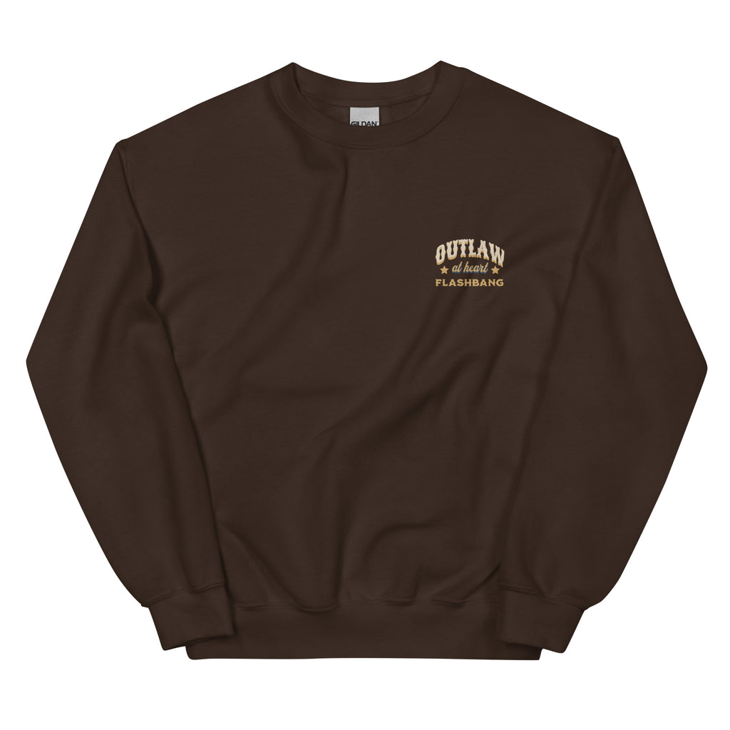 Brown sweatshirt with 'Outlaw at heart Flashbang' text on a white background