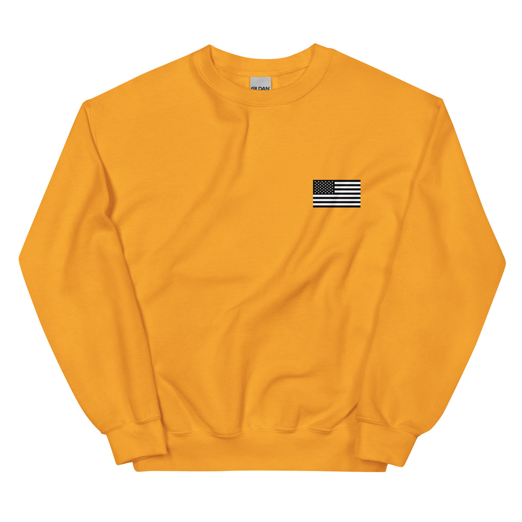 Yellow sweatshirt with a small American flag patch on a white background