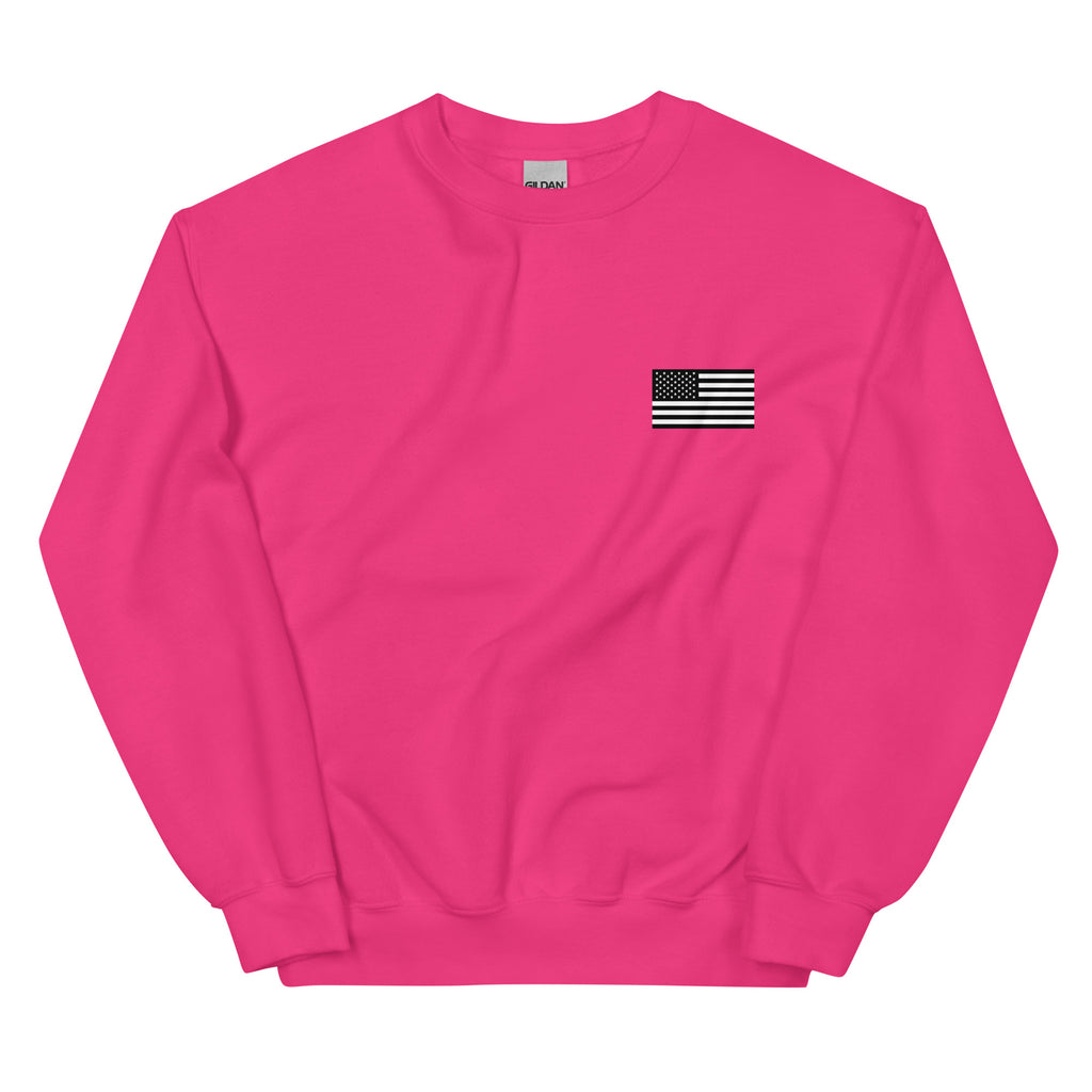 Pink sweatshirt with a small American flag patch on a white background