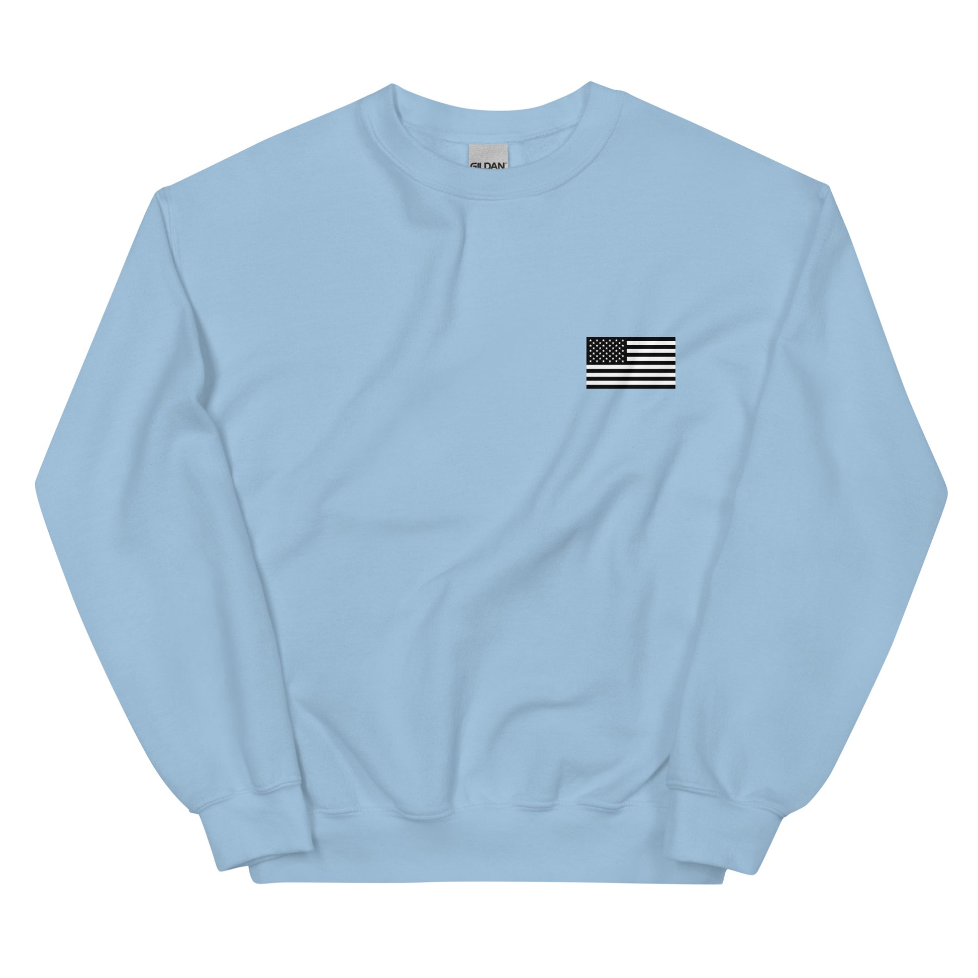 Light blue sweatshirt with a small American flag patch on a white background