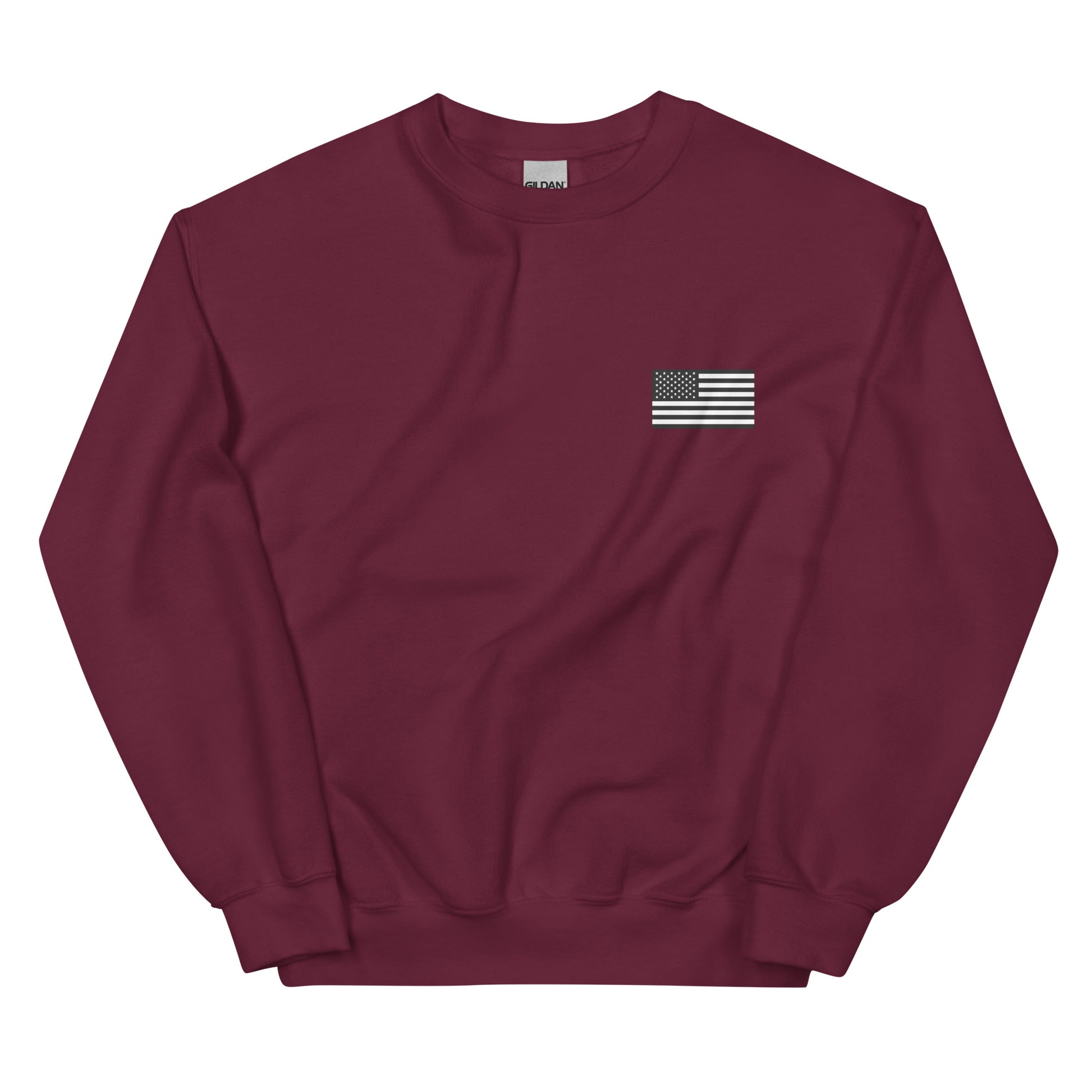 Maroon sweatshirt with a small American flag patch on a white background