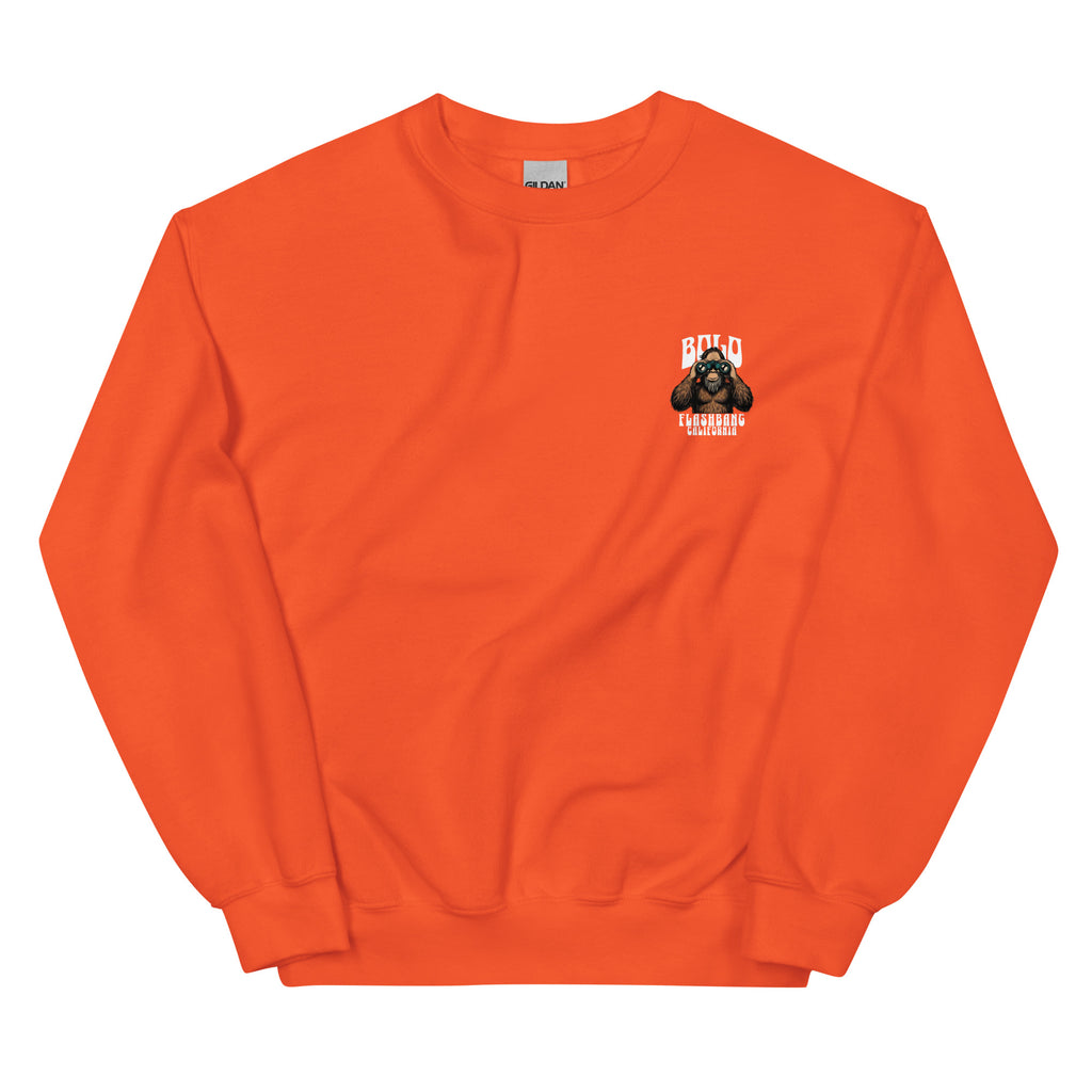 Orange sweatshirt with a small graphic on the chest against a white background