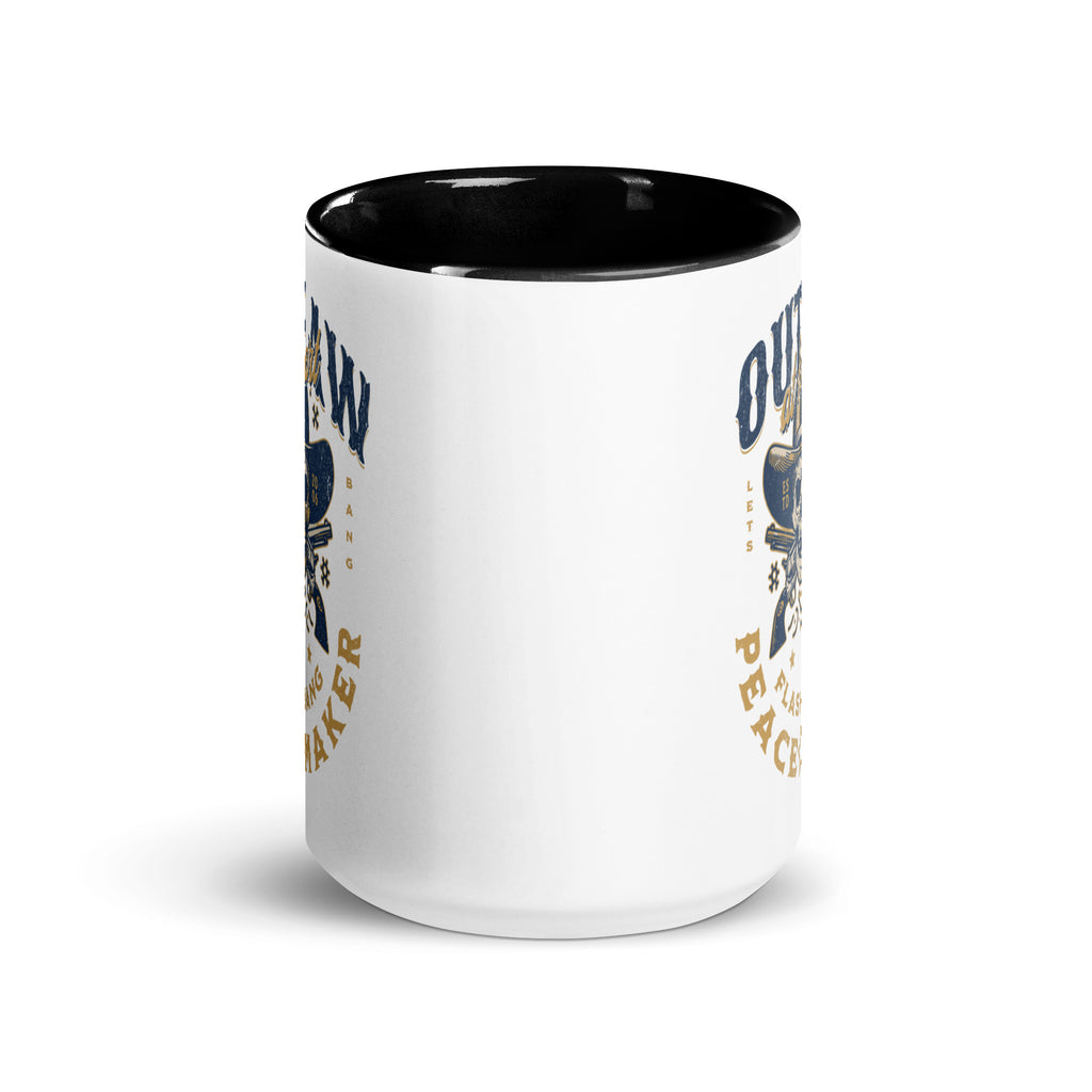 White mug with black interior and colorful design on a white background