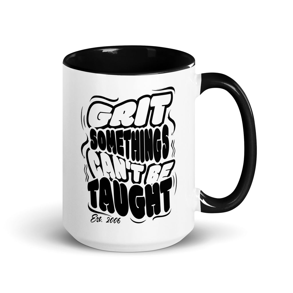 White mug with black interior and handle, featuring the text 'GRIT SOMETHINGS CAN'T BE TAUGHT Est. 2006' on a white background.