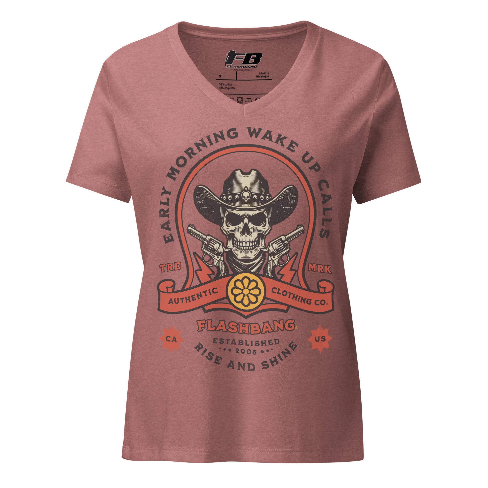 Pink t-shirt with a graphic design featuring a skull in a cowboy hat and text on a white background.